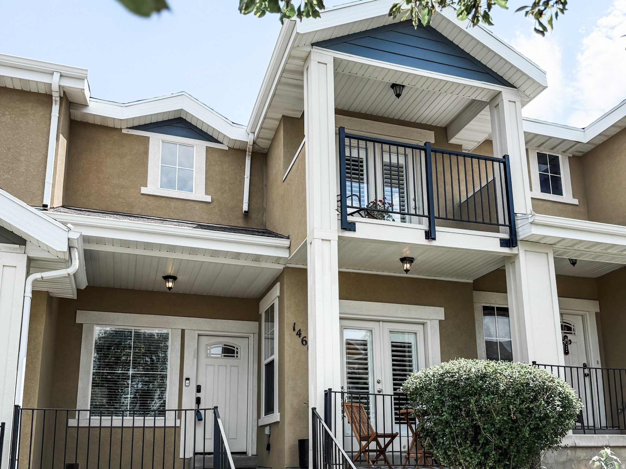 Turnkey and impeccably maintained, this beautifully updated townhome stands out with premium renovations and designer finishes throughout.  The stylish kitchen and remodeled bathrooms offer timeless appeal.  Relax in the spacious owner's suite featuring a spa-like bath with a two-person soaking tub, oversized Euro glass shower, and large walk-in closet.  Enjoy mountain views from the private balcony or unwind on the charming patio.  The unfinished basement offers room to grow with space for an additional bathroom, bedroom or family room.  Ideally located directly across from the community clubhouse, workout facilities, pool and additional guest parking.  Close to Mountain View Corridor and shopping at Mountain View Village.  Move-in ready with style, comfort, and future potential!