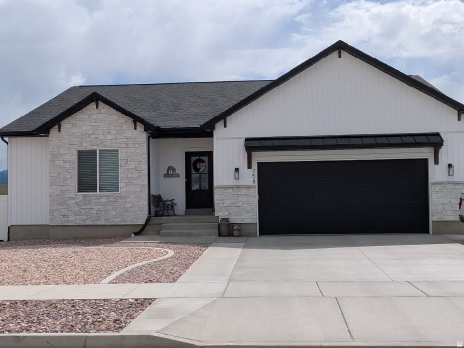Don't miss this incredible opportunity to own a beautifully upgraded, like-new home featuring breathtaking south-facing panoramic views of Paradise and the Wellsville Mountains. This exceptional property offers countless upgrades and custom additions, highlighted by elegant black trim and modern finishes throughout.   Enjoy the newly finished basement, providing additional living and entertaining space, along with professionally completed landscaping that enhances the home's curb appeal and outdoor enjoyment   With no backyard neighbors, you'll appreciate the added privacy and unobstructed views from your own backyard retreat. Combining style, comfort, and an unbeatable location, this home is truly move-in ready and offers a rare chance to enjoy mountain living at its finest.   Schedule your showing today-this one won't last long!