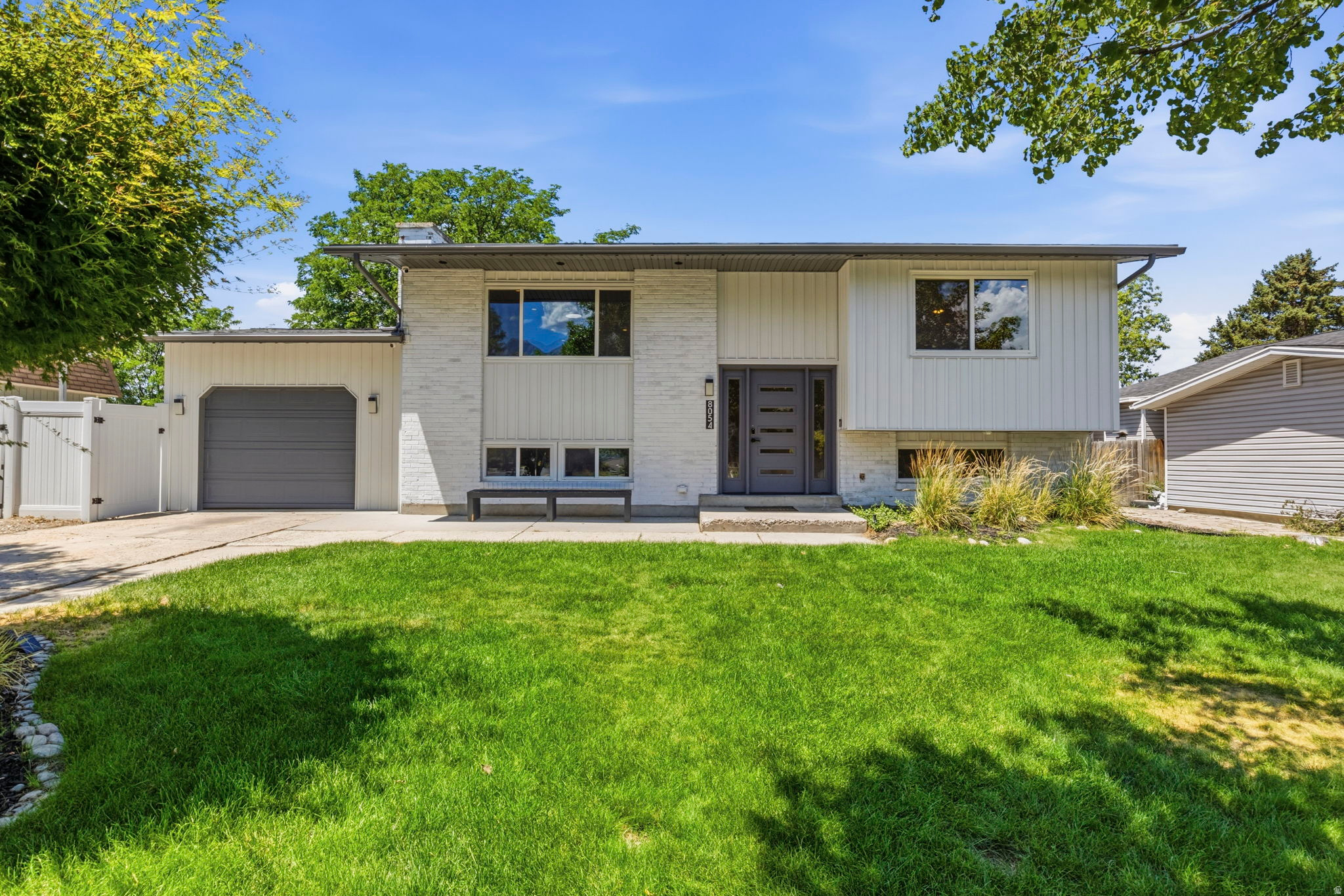 Nestled in one of east-side Sandy's most desirable neighborhoods, this well-maintained home offers the perfect opportunity to move right in and make it your own. The spacious backyard is ideal for kids, entertaining, or simply enjoying evenings with family and friends.  The big-ticket improvements have already been taken care of, including a newer roof, tankless water heater, furnace, vinyl windows, siding, vinyl fencing, and kitchen appliances-all replaced within the last four years. With the major systems already updated, you can enjoy the home from day one without worrying about the big-time expenses.  Located in an exceptional neighborhood and priced to provide outstanding value, this home is ready for its next chapter.