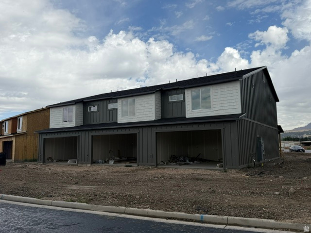 Discover the perfect blend of modern style and everyday comfort in this brand-new townhome located in one of North Ogden's most desirable neighborhoods. This spacious end unit offers 3 bedrooms, 2.5 bathrooms, and a 2-car garage, providing extra privacy and abundant natural light. Enjoy an open-concept floor plan designed for effortless living and entertaining, while taking in beautiful mountain views right from your home. Conveniently located in the heart of North Ogden, you'll be just minutes from parks, schools, shopping, dining, and outdoor recreation. Don't miss this opportunity to own a stunning new construction home in an exceptional location! ASK about current builder incentive.