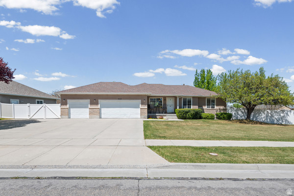 Look no further! Amazing remodeled Riverton home! Located on a third acre corner lot in quiet cul-de-sac, this beautiful home has many stand out interior features. In the kitchen you'll enjoy custom built Knotty Alder soft-close kitchen cabinets with new back splash and Corian counter tops. Kitchen also features a spacious pantry and lot's of cabinet space. The dining room has ample space for family meals. The kitchen, dining room and front room all create a large open great room space for gatherings with friends and family. Other new features include a newer oak, maple and hickory mix of gorgeous hardwood flooring and new carpet throughout upstairs and basement. Also you'll love the new custom made Knotty Alder banisters with iron spindles leading to the basement. Newly updated bathrooms upstairs feature granite counter tops, new toilets and custom built Knotty Alder cabinets. Enjoy the beautiful new soft tone paint colors throughout upstairs and the basement along with new case molding. There is also a warm cozy gas fireplace in the upstairs family room. The basement is an entirely separate mother-in-law living space featuring private walk in access, kitchen, laundry area, two bedrooms, full bath and a spacious family room. The family room is wired for surround sound and includes the large screen TV. The basements remodeled bathroom includes corian counter tops, new toilet and custom built Baltic Birch vanity cabinets. The home has a spacious three car garage with a new garage door opener, laundry hookups and a 34 foot long RV parking space. Other exterior features are newer roof (2019), beautiful mountain views, huge backyard with mature trees and a play gym. Sprinklers are full auto and operate off secondary water saving you lots of money in water cost. Other area features include the newly updated South Midas Creek Park, "The District" shopping and dining, and close proximity to schools and the Bangerter Highway. Don't miss out on this fantastic opportunity to make this gem your new home!