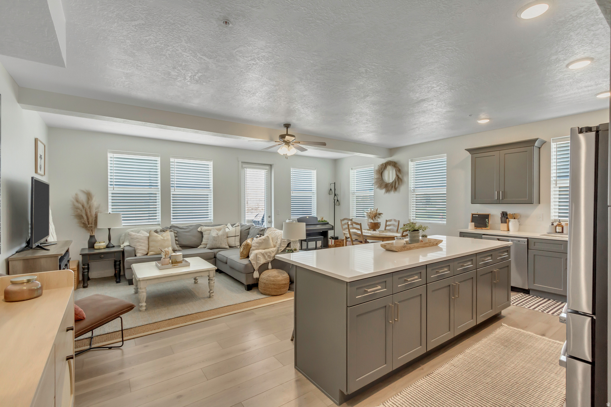 OPEN HOUSE SATURDAY, MAY 23rd, 12:30 pm - 2:30 pm. Gorgeous 2023-built 2-bed, 2-bath condo offering true main-level living with no stairs. Garage + storage unit just steps from your front door. Large patio off the living room with unobstructed views. Pond, playground & walking paths right across the street. Future community amenities include a clubhouse & gym. Move-in ready! Square footage figures are provided as a courtesy estimate only and were obtained from the previous MLS.  Buyer is advised to obtain an independent measurement.