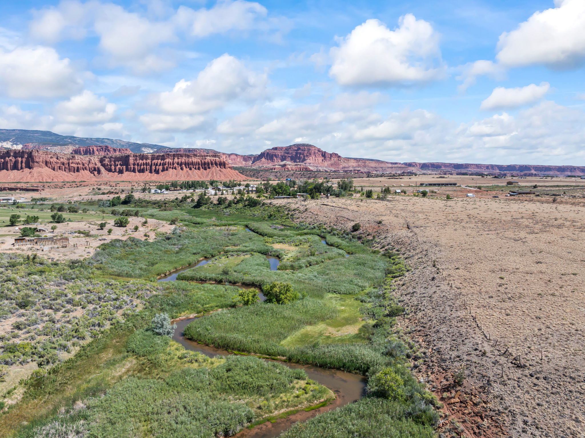 Stunning River LOTS!! Experience the Heart of Scenic Southern Utah Discover the perfect canvas for your dream home in the newly developed Red River Cove subdivision, ideally situated at 925 West 100 South in the picturesque town of Torrey. Nestled near the stunning landscapes of Capitol Reef and Thousand Lakes, these premium building lots offer a rare opportunity to own a piece of Utah's natural beauty. The subdivision offers a variety of lot sizes to suit different needs, with infrastructure projected to be build-ready by late Summer 2026. Lot Size Highlights 3-3.09 Acre Lots available. Premium lots (approx. 130,680 sq. ft.). These include Lots 6,7,8. Exclusive Pre-Construction Incentives Buyers can maximize their value by taking advantage of combined discount opportunities: Pre-Completion Discount: Receive 10% off any lot purchased before the subdivision infrastructure is finished. Preferred Builder Incentive: Secure a 15% discount on your lot when you contract with Simmons Construction & Contracting to build your home. Maximum Savings: Combine both offers for a 25% total discount when purchasing and signing a build contract before subdivision completion. Volume Discounts: Special pricing is available for the purchase of multiple lots. Builder & Financing Information Custom Homes: Simmons Construction will have home plans available shortly for buyers interested in a lot-and-home package. Water and power are stubbed to lot. Septic Approval: All lots are approved for individual septic systems.