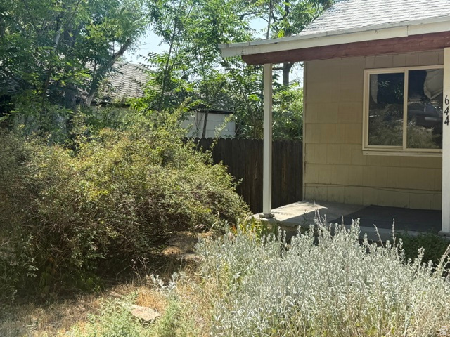 Humble little home with mo-in-law apartment down. Has been used as a rental for decades. Each unit has its own washer/dryer, downstairs has separate entrance.  Single meter/thermostat for both units. Located just below the U of U, bus routes and TRAX stop. Great investment property or would work nicely for student housing with rent help from downstairs to make your mortgage payment each month.  Two stoves/refrigerators. Lot goes waaaay back behind the home and very secluded-major possibilities!  See agent remarks for showings.