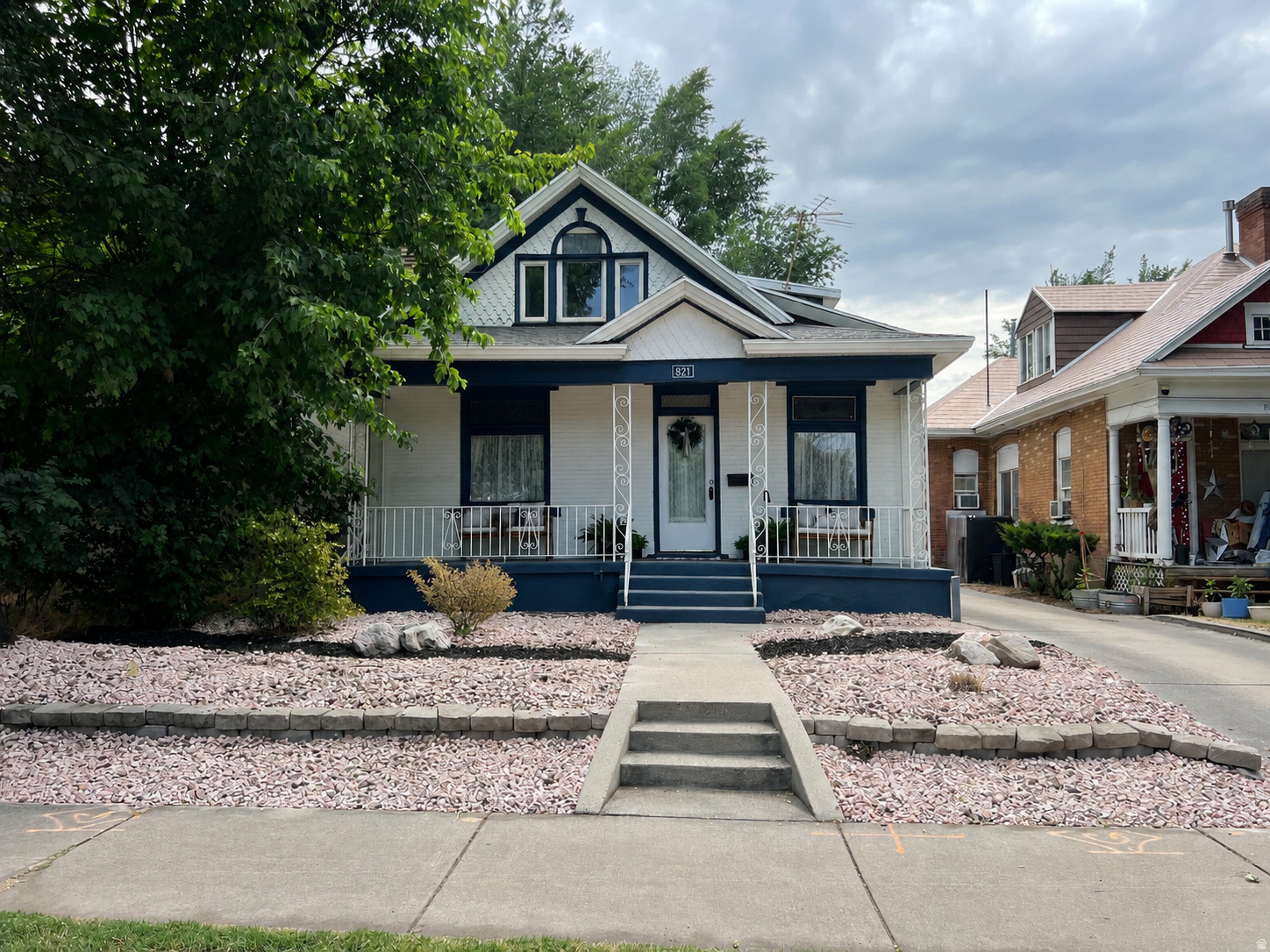 Beautifully updated historic Victorian offering the perfect blend of timeless character and modern convenience including Ultra High Speed Google Fiber 8+Gbps Capable Internet. The front residence features 3 bedrooms, 1 fully remodeled bathroom, original woodwork, decorative leaded glass windows, original fireplace, rich millwork, and an upstairs bedroom/flex space complete with a built-in desk, dedicated heating with thermostat, and window A/C. The home has been thoughtfully updated with remodeled shaker cabinetry, quartz countertops, updated electrical and plumbing, newer water heater with expansion tank, updated electrical panel, and many newer vinyl windows while preserving its historic charm. Attached to the rear of the home is a fully renovated Accessory Dwelling Unit (ADU)/mother-in-law apartment featuring a private living room, bedroom, kitchen with pantry, and updated bathroom. Renovations include new laminate flooring, new windows, stainless steel appliances, a gas range, updated lighting, and tasteful finishes throughout, making it ideal for rental income, multigenerational living, guests, or a private home office. Additional features include a one-car garage with a new roof, outdoor storage shed, 30-amp exterior EV charging outlet,  Low-maintenance landscaping with fully operational drip irrigation systems in both the front and backyards. A rare opportunity to own a historic Salt Lake City home that combines preserved architectural character, modern mechanical updates, and the flexibility of an attached income-producing ADU.   Square footage figures are provided as a courtesy estimate only and were obtained from tax data.  Buyer is advised to obtain an independent measurement.