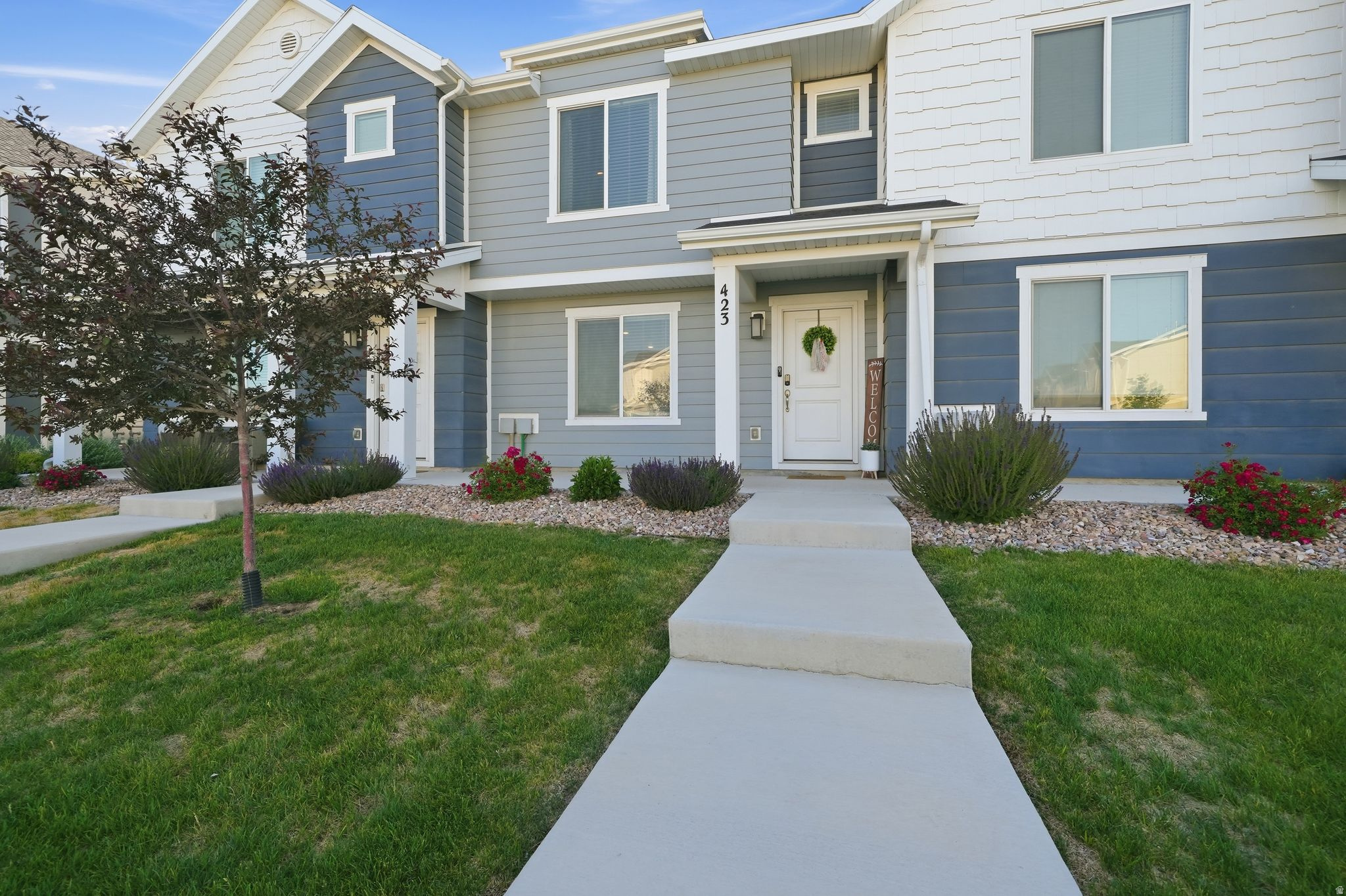 Open House Saturday 11am - 1pm.   Seller requests no showings prior to the open house on Saturday.   Welcome to Northshore, one of Saratoga Springs' most sought-after communities! Lovingly maintained by its original owner, this beautifully upgraded two-story townhome offers the perfect blend of comfort, functionality, and style.  Thoughtful custom touches set this home apart, including a charming built-in dining nook that creates the perfect gathering space and a custom barn door leading into the primary suite bathroom. One of the home's most unique features is the oversized crawl space with 8-foot ceilings and staircase access, providing an incredible amount of easily accessible storage rarely found in townhome living. The spacious floor plan includes a two-car garage, bright and open living spaces, and a welcoming front patio that enjoys cool evening shade-ideal for relaxing after a long day.  Living in Northshore means enjoying resort-style amenities right outside your door, including a community pool, clubhouse, pickleball courts, walking paths, and one of the area's best dog parks.  Conveniently located near shopping, dining, schools, and Utah Lake recreation, this home offers an exceptional lifestyle in a thriving community. Don't miss your opportunity to own this move-in-ready townhome with upgrades, storage, and amenities that truly set it apart.