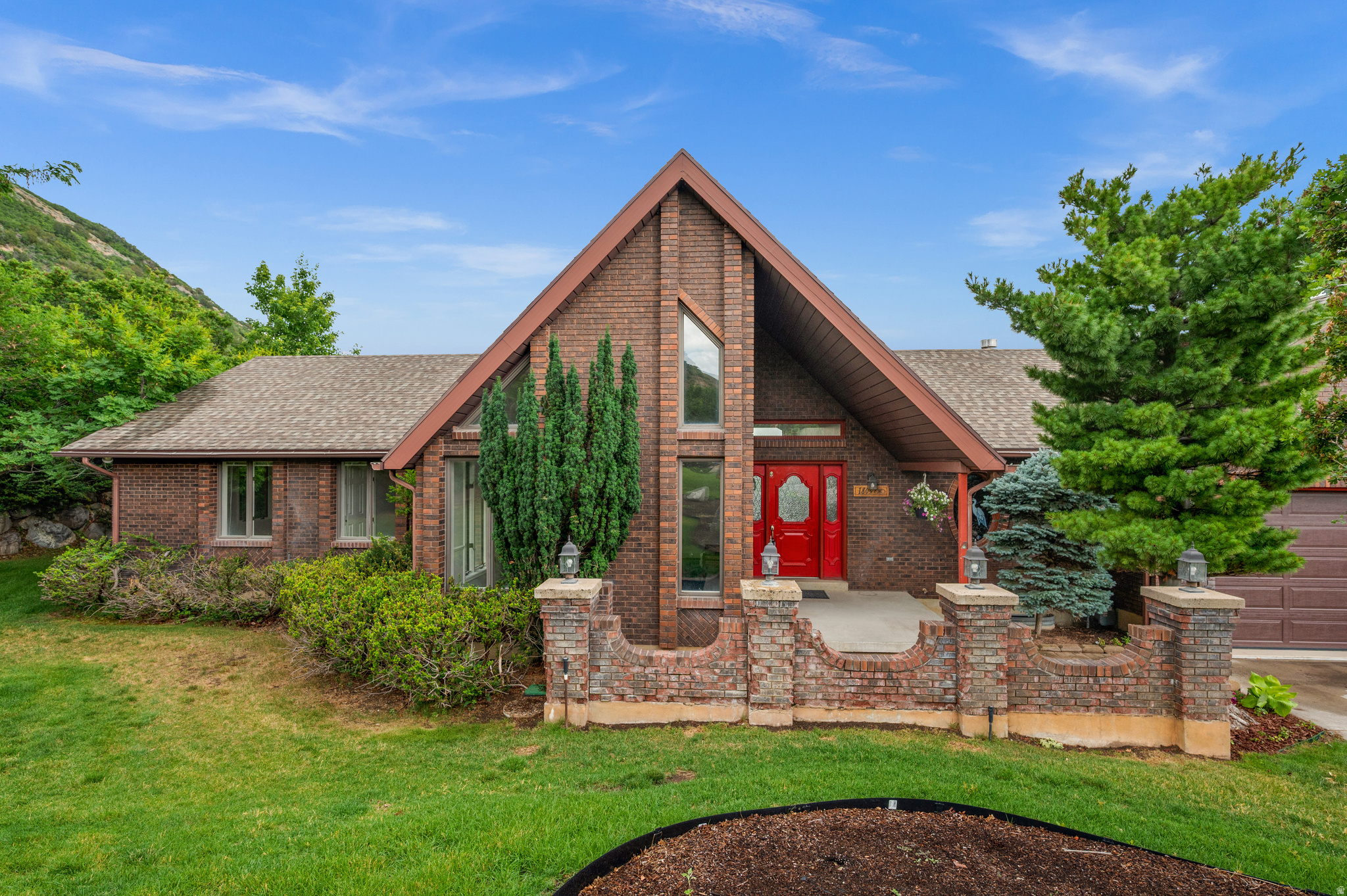 This is one of those remarkable properties that only comes along once in a generation (it has had the same owner for almost 30 years).  Why?  The location is unparalleled, on a quiet cul de sac surrounded by beautiful homes on large lots in one of Ogden's most desirable pockets.  And there's the stellar view from the large back deck, looking out over the truly enormous back yard.  On the inside, the house has great mid-century aesthetics and amenities that are hard to find, including a primary suite, a total of six generous bedrooms, and a sizable basement family room with french doors that open onto a shaded rear patio.  Plus there's a unique multipurpose room on the lower level with its own garage door that would make an fantastic workshop or a luxurious gym.  This property is a gem.  Call today to schedule a private showing.