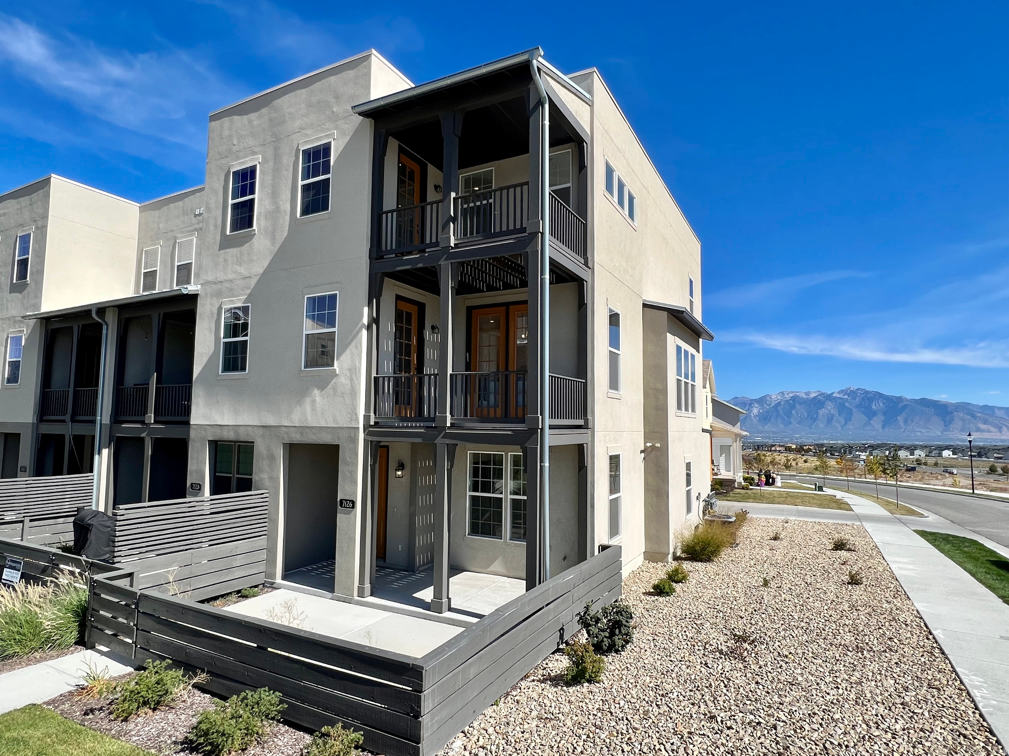 Rare opportunity to customize your own Townhome! This will be the last set of townhomes built in the desirable Oquirrh West community. Hurry in before construction starts to have the opportunity to attend design appointments in our state of the art design studio. Pick your own finishes and colors with help of professional interior designers. These aren't your average townhomes, boasting two large covered balconies and a covered front porch/patio area. These homes provide indoor/outdoor living at its finest. This spacious 2140 sq ft home offers plenty of space with the possibility of 4 bedrooms and 3.5 bathrooms. You will love the large great room that is designed for entertaining, plus a separate flex space perfect for an office or much more. Offering 9'-10' foot ceilings throughout and tons of natural light, and a convenient location. Contact this listing agent for an appointment to tour models.