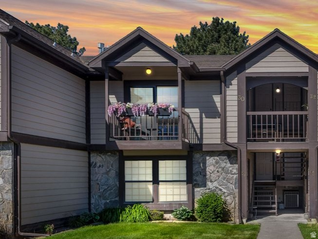 Beautifully modernized 2bed/2 bath condo, tucked into the peaceful, well-kept grounds of Stonegate.  This home is exceptionally clean and truly move-in ready! Features include: remodeled kitchen,  stone countertops, vaulted ceilings,  and gas fireplace. The primary ensuite bath with large shower, and deep soaking tub in the secondary offer exceptional value at this price-point. Tasteful updates and modern fixtures  are found throughout! Amenities include pool, community center, and serene duck pond. This unit also includes TWO covered parking spaces. Enjoy scenic mountain views along with easy access to shopping, dining, recreation, and commuter routes. Excellent value with a low-maintenance lifestyle. Sqft provided as courtesy. Buyer to verify all.