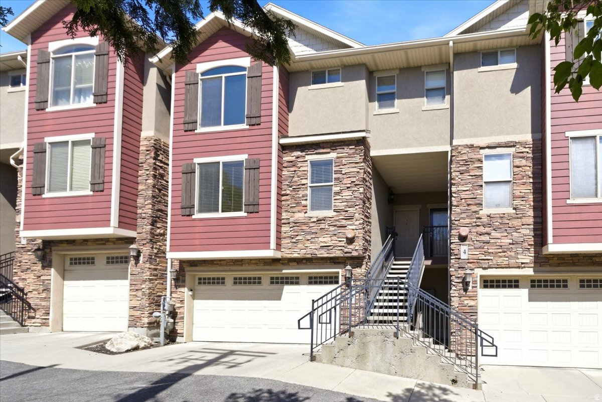 Tucked into the vibrant Central City neighborhood, this thoughtfully designed townhome offers an easy, connected lifestyle just moments from downtown Salt Lake City. Bright, open living spaces create a natural flow for everyday life, while an office nook offers room to study, create, or work from home. Upstairs, the primary suite and an additional bedroom and bathroom provide a comfortable retreat, with laundry facilities on the same level. The lower level includes a spacious two-car garage with extra storage and access to a private shaded patio.  With TRAX, the U of U, restaurants, grocery stores, and downtown energy all within reach, this home delivers comfort, convenience, and the best of city living right outside your door.