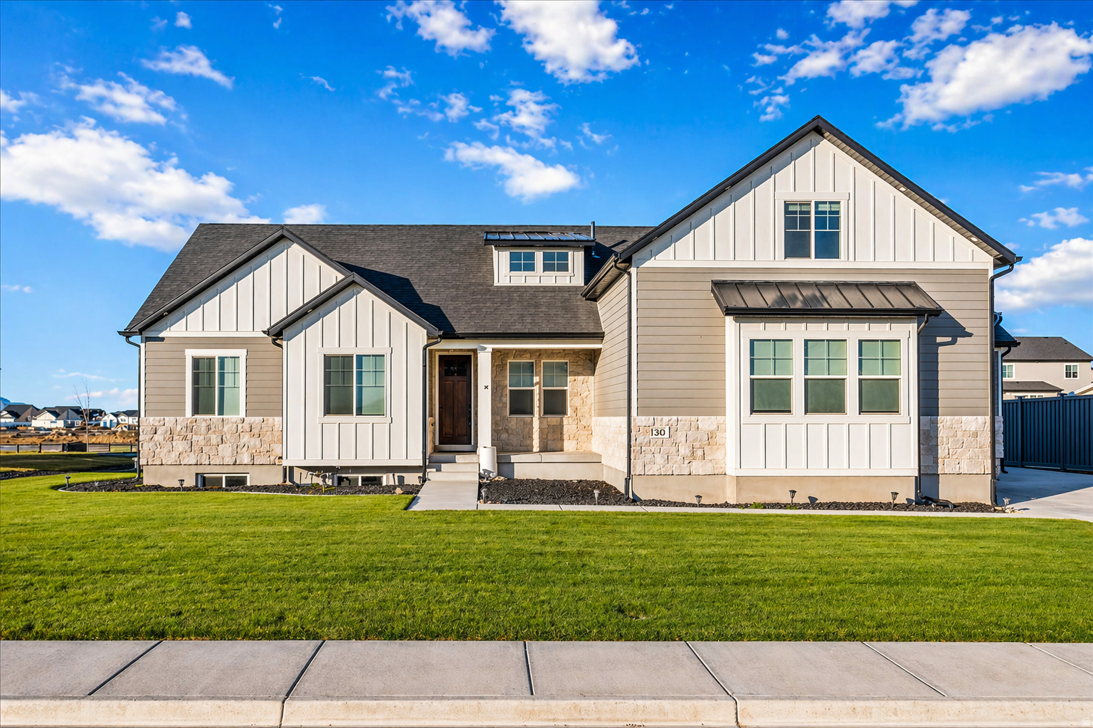 No other home like this. Loaded with upgrades and showing like a model, this newer rambler with a large bonus loft is located directly across from the private lake in the gated Pier community, just 28 minutes from Downtown Salt Lake City. The current owner has only occupied the home very part-time over the past few years, and it truly looks and feels brand new. This gorgeous custom home offers 3 bedrooms, 3 bathrooms, a dedicated office, and a large loft that can be used as an additional bedroom, second living area, playroom, or flexible bonus space. High-quality finishes are featured throughout, including a gourmet custom kitchen with gas cooktop, hood, and double ovens, three-tone paint, a custom fireplace with stone and hearth, tile flooring and surrounds in all bathrooms, and numerous designer upgrades. The spacious owner's suite includes a freestanding tub, separate shower, and a large walk-in closet. Additional highlights include a covered patio, fully landscaped yard, and countless upgrades inside and out. Enjoy resort-style living in the private, gated Pier community with easy walking access to the lake, biking and walking paths, a wakeboarding system, lake activities, and an aqua playground. Outdoor enthusiasts will also love being minutes from pickleball courts at Porter Way Park, nearby parks, and Stansbury Park Golf Course, along with the community's popular Food Truck Thursdays. Ideally located near schools, approximately 10 minutes from the brand-new Deseret Peak High School, close to the Tooele Temple, and just minutes from major retail growth at The Peak at Compass Point, anchored by Smith's Marketplace. Founders Pointe continues to expand with shopping and dining options including Hobby Lobby, Five Below, Chipotle, Chili's, with Ulta, Ross, TJ Maxx, and Old Navy currently under construction. With quick I-80 access and a prime location in one of Tooele County's most vibrant and fast-growing communities, this home offers an exceptional blend of luxury, lifestyle, and convenience.