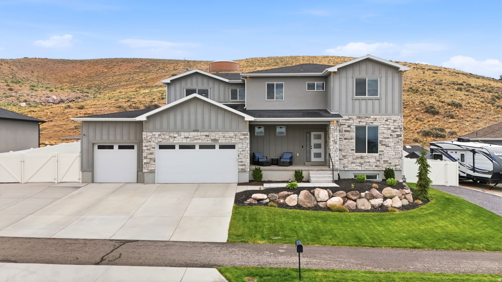 The kind of property that rarely hits the market! This 4-bedroom, 3.5-bath home sits on a half-acre lot that backs to open space, with no rear neighbors. Inside, you'll find a dedicated office with custom built-in shelving, a kitchen with stacked cabinets to the ceiling, and a beautiful two-story fireplace. The home also has a separate mother-in-law apartment with its own entrance. Outside, enjoy a fully fenced yard zoned for livestock, an RV parking pad, and a covered back porch. If you've been searching for a home that offers versatility, privacy, and space to live the way you want, this is it.