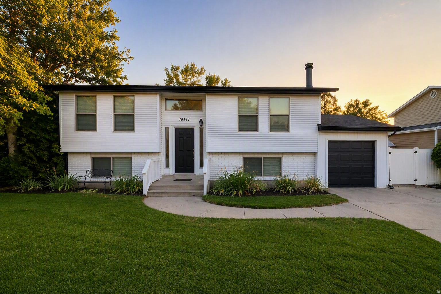 House hack, generate rental income, or enjoy multi-generational living. Remodeled throughout, this Sandy home features a walkout basement with separate entrance, kitchen, bedrooms, and bath. Enjoy a recently painted exterior, large deck, garden beds, and two storage sheds. New roof in 2025 and smart home upgrades including a smart thermostat, sprinkler system, doorbell, and front door lock.