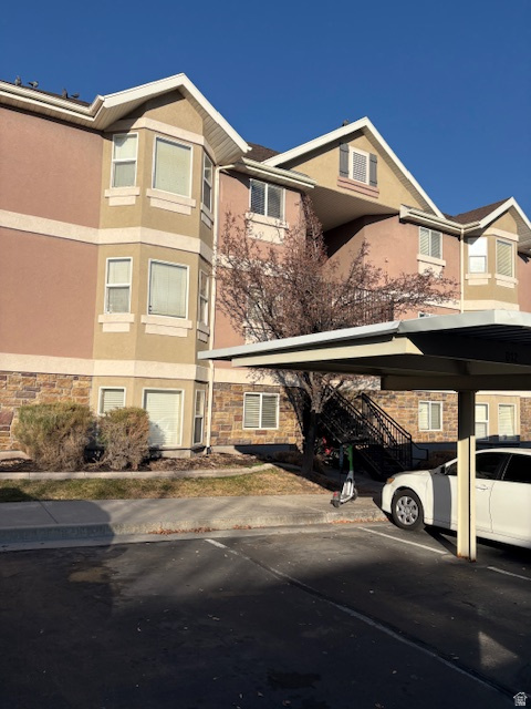Short SALE!!   SELER FINANCING!!! Ground level, 2 covered parking, 3 beds, 2 baths, 12%down, Monthly pmt $2260 +240 Hoa. Enjoy convenient, single-level living in this bright, ground-floor corner unit with no stairs. The spacious, open-concept floor plan features a well-appointed kitchen with maple cabinetry, modern appliances, and a stylish tile backsplash. The primary suite includes a generous walk-in closet complete with a custom built-in organizer.  Low-maintenance laminate flooring runs throughout, and abundant storage adds to the home's functionality. Step outside to your covered, fenced patio-perfect for relaxing or entertaining-overlooking open green space near the community pavilion and playground.  Located in a beautifully landscaped, gated community, this home offers comfort, privacy, and ease of living. Pet-friendly and move-in ready, it's an ideal choice for those seeking both convenience and charm.