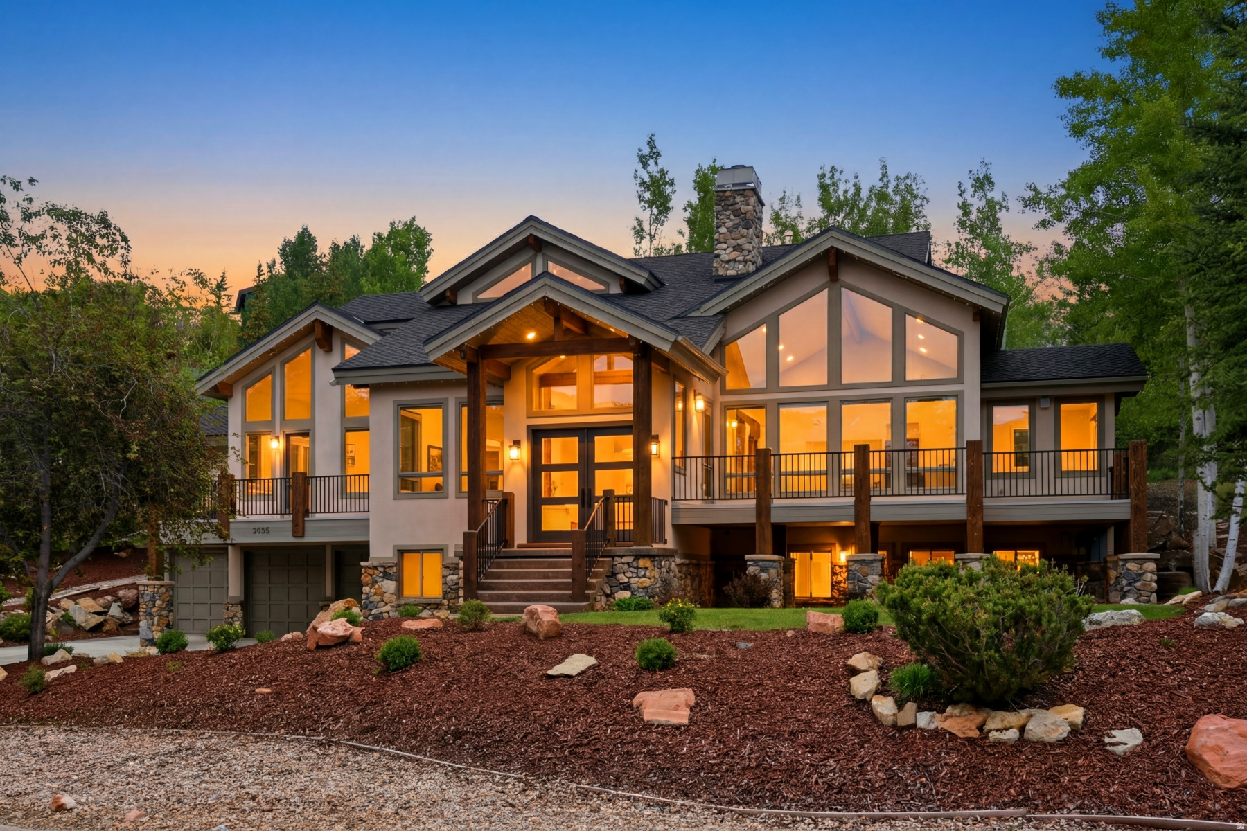 A true crown jewel of Sun Peak in this stunningly renovated home. This exceptional mountain residence is perfectly positioned on the quiet section of Mahre Drive capturing beautiful mountain vistas and ski run views. Thoughtfully and extensively renovated, the home seamlessly blends timeless elegance with modern comfort, creating a retreat that is as sophisticated as it is inviting. Rich new hickory flooring flows throughout the entire home, providing warmth and continuity with no carpeting anywhere. At the heart of the residence, a stunning new chef's kitchen showcases premium WOLF appliances, custom finishes, and beautifully curated design details. The luxurious primary suite offers a private sanctuary, highlighted by a spacious deck and completely re-imagined spa-inspired bath. Designed for both grand entertaining and everyday living, the dramatic Great Room features soaring ceilings, expansive windows, and an abundance of natural light. The space effortlessly extends to a generous deck, where panoramic mountain scenery provides a spectacular backdrop for gatherings or quiet evenings enjoying the alpine surroundings. The home's back setting offers an entirely different experience--nestled among mature trees, a private deck creates a peaceful escape for grilling, dining, and relaxation. Every bedroom enjoys the privacy and convenience of an en suite bath, complemented by powder rooms on each of the main living levels. Comfort and functionality abound with radiant heat, central air conditioning, a spacious three-car garage, and an oversized gear room ideally suited for skis, bikes, golf clubs, and all the essentials. A newer Presidential shingle roof further reflects the care and investment made throughout this remarkable property. As part of the highly desirable Sun Peak community, residents enjoy access to the Sun Peak Clubhouse with outdoor pools, fitness and pickle and tennis courts.