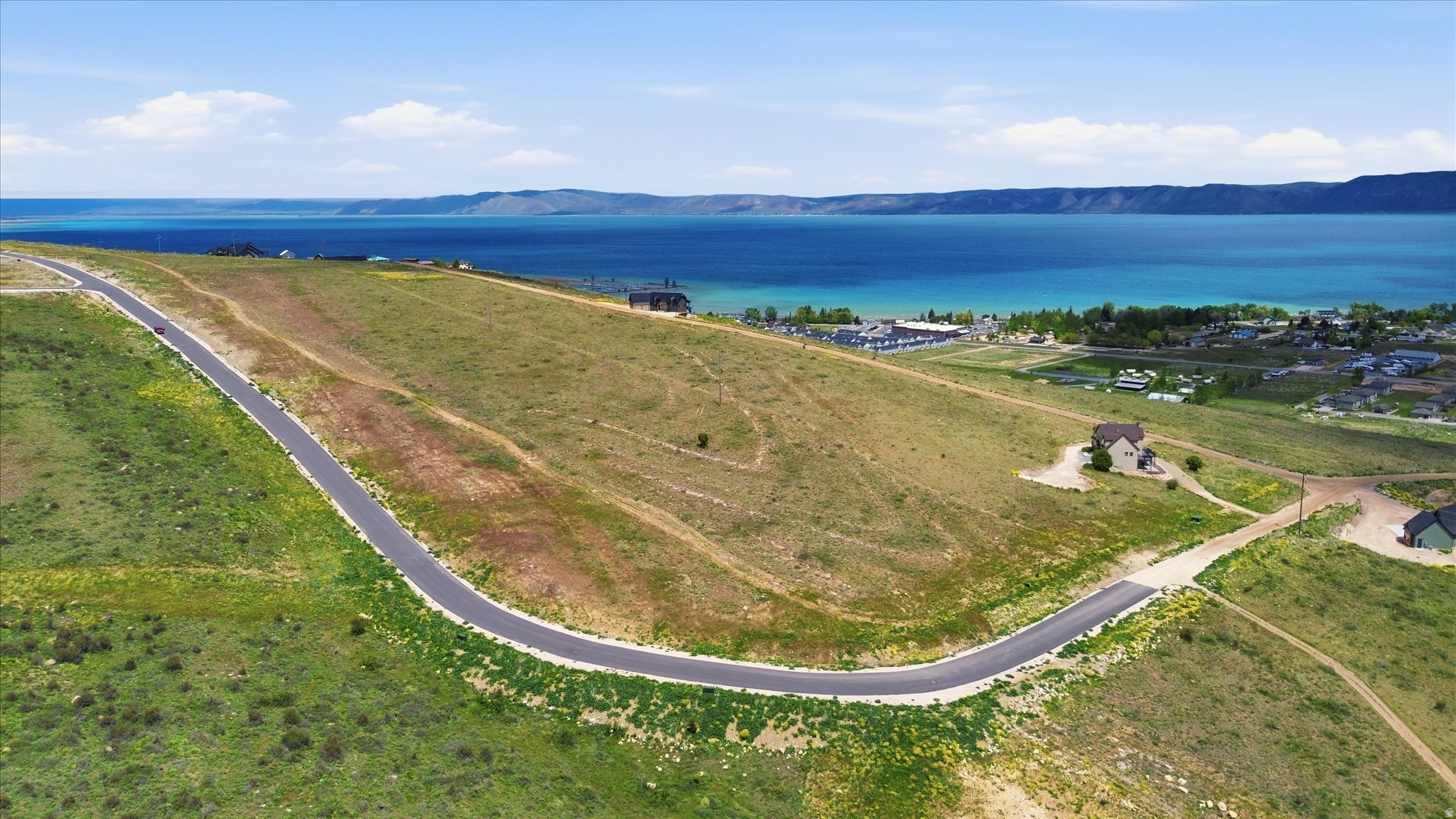 Discover Lot 65 at Lakeview at Bear Lake, a prime opportunity to own a premium view lot in one of Bear Lake's most exciting developments. This beautiful homesite features incredible lake and mountain views with the perfect setting for a custom cabin, luxury getaway, or vacation rental investment property.  The lot includes a prepaid water connection, adding immediate value and helping reduce upfront building expenses. Short-term rentals are allowed, making this property ideal for both personal use and income potential in the rapidly growing Bear Lake vacation market.  Conveniently located near Garden City, Bear Lake beaches, boating, dining, trails, and year-round recreation, Lot 65 offers the perfect balance of privacy, accessibility, and scenery. The generous lot size and premium location make this an outstanding opportunity to build in one of Bear Lake's most desirable areas.  Whether you are looking for a family retreat, investment property, or future dream home site, Lot 65 delivers exceptional potential with unmatched views and location.