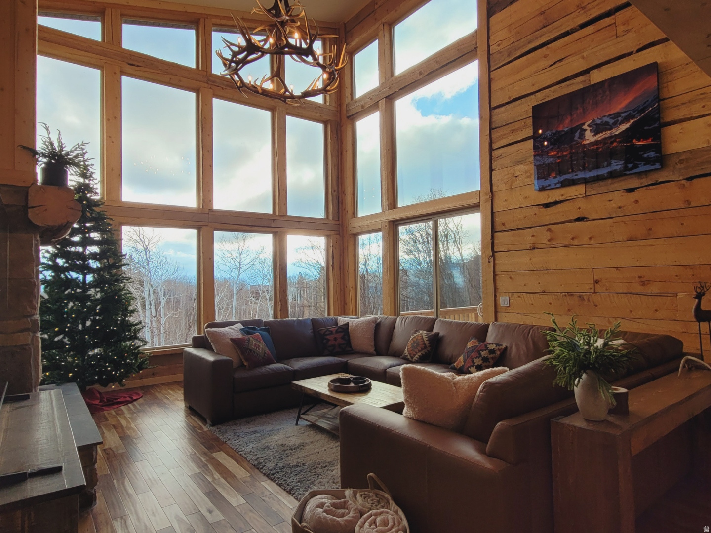 Contemporary Log Home | Built 2025 | Panoramic Ski Resort Views Welcome to a rare offering of mountain craftsmanship and modern design. Built in 2025, this contemporary log home showcases locally sourced and custom milled logs from the Uinta Mountains, bringing authentic Utah character to every corner of the home. Perched to capture sweeping views of both Deer Valley and Park City ski resorts, this residence blends rustic warmth with clean, contemporary lines-soaring windows frame the slopes while natural wood elements ground the space in timeless mountain style. Whether you're seeking a private forest lot or a mountain estate, this one-of-a-kind property offers the perfect balance of new construction quality and old-growth character. Interior finishes include natural log finishes, custom alder doors, rich acacia hardwood floors, hickory kitchen cabinets, custom granite countertops, and a built-in home theater, while the exterior features include an expansive redwood deck and a Sundance spa. For added comfort and peace of mind, the home is equipped with a high efficiency heat pump with central air conditioning, Starlink internet, security cameras, propane tank, interior and exterior fire alarm systems, and fire sprinklers. This furnished turnkey residence is ready to enjoy from day one-all within reach of world-class skiing and Park City's renowned dining, shopping, and entertainment. A true custom build - thoughtfully designed, locally sourced, and ready to showcase the best of Utah mountain living.   Square footage figures are provided as a courtesy estimate only and were obtained from plans.  Buyer is advised to obtain an independent measurement.
