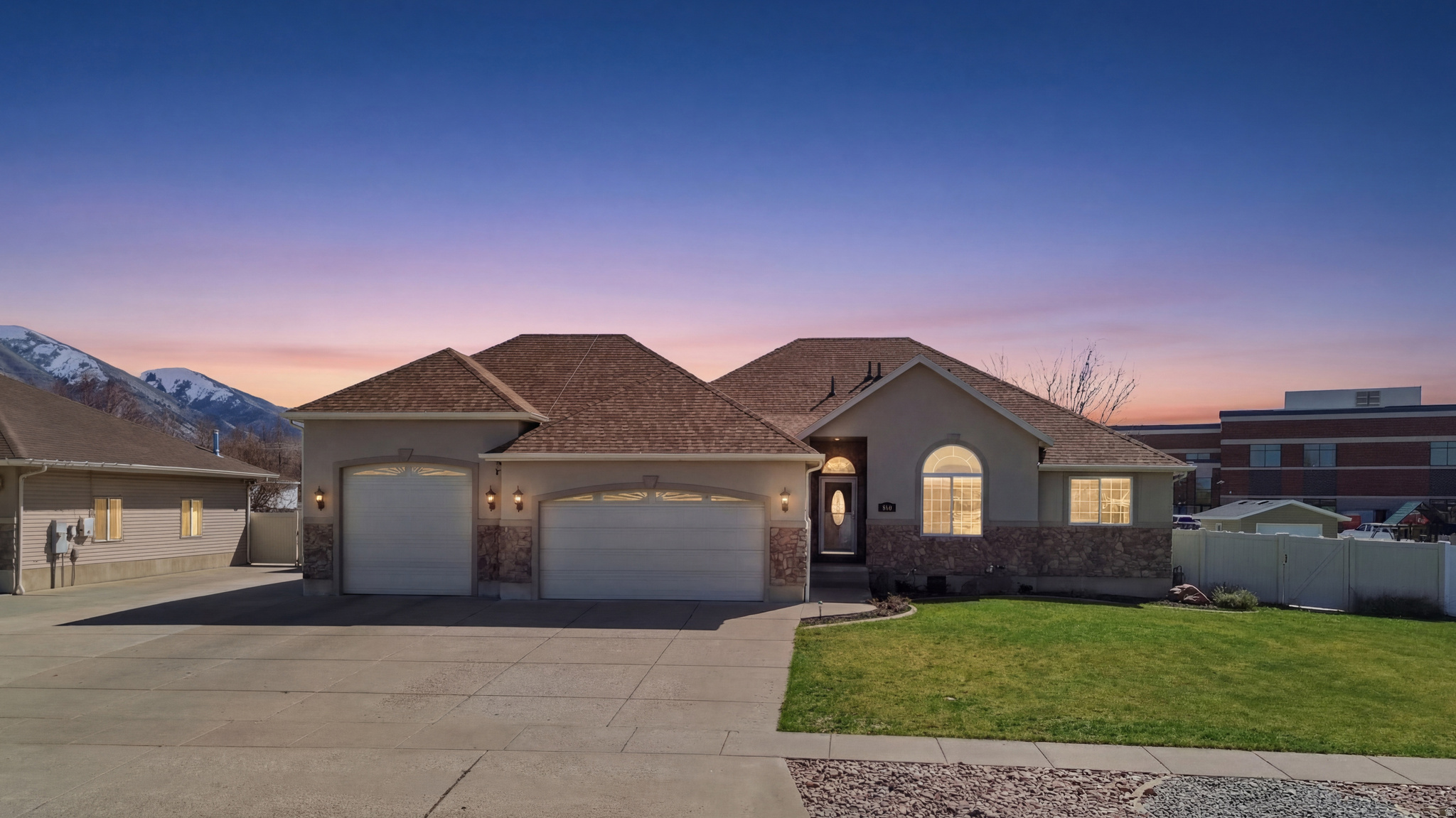 ***Seller offering $5,000 in concessions toward buyer's closing costs or interest rate buy-down.***  Welcome to this stunning custom home in the highly sought-after Nibley Gardens neighborhood, where thoughtful design, high-end upgrades, and everyday comfort come together beautifully. From the moment you arrive, you'll notice the exceptional attention to detail and features that truly set this home apart. This beautiful home is loaded with extras, including radiant heating throughout all floors (even the garage), a built-in humidifier, a radon mitigation system, solar panels, and a whole-home stereo system you can enjoy throughout the entire house. The kitchen is a standout with quartz countertops, double ovens, and beautifully crafted cabinetry, perfect for both daily living and entertaining. Inside, you'll love the gorgeous hardwood flooring, vaulted ceilings, a cozy stone fireplace, a spacious laundry room, and a remodeled primary bathroom featuring a large, luxurious shower. Outside is just as impressive with a fully landscaped yard, a covered patio, and a built-in firepit, creating the perfect space to relax or host gatherings. The property also offers a 16x18 shed, an oversized (15x31) air-conditioned third garage bay, and a large RV pad, giving you all the space you need for vehicles, toys, and more. This is one you truly need to see in person! Square footage figures are provided as a courtesy estimate only and were obtained from an appraisal. Buyer to verify all information. Please allow 2 hours notice for all showing requests.