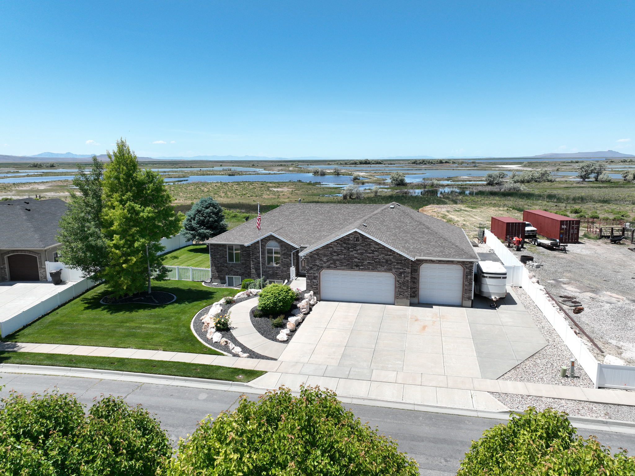 Price REDUCED Another $10K! Sellers are willing to help with buyers closing costs or Rate Buydown! Unique Location with no backyard neighbors and stunning views of antelope island! Views that will take your breath away! Wildlife of all kinds frequent the area and allow for quiet peaceful evenings! Beautiful BRICK Rambler! . Fireplaces up and down will allow for comfort during the winter months. All HVAC units have been replaced or serviced. Established neighborhood with mature landscaping and a finished basement! Gas Fireplace in basement adds a lot of heat in the basement family room! Home has a covered walkout basement with RV Parking that allows easy access to the basement. Summer BBQs on your covered deck as you watch the summer storms arrive with a front row view. Yard is fully fenced allowing your pets to roam freely. Lots of possibilities in the garage room area seen in the photos. 220 Power in garage! Call to view this super maintained home in a rare opportunity location!