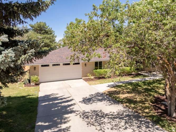 Rare opportunity to own a beautiful 4700 sq. ft., 7 bed, 5 bath, updated home on a spacious 0.50-acre lot in one of the most desirable areas of the valley.**  Designed for both everyday living and entertaining, the stunning kitchen features an oversized island perfect for gathering and entertaining. The primary suite is a retreat of its own, complete with a luxurious soaking tub, perfect for unwinding after a long day.**  A standout feature is the separate mother-in-law suite offering 3 bedrooms, 2 bathrooms, a full kitchen, and laundry, ideal for multi-generational living or rental income.**  Enjoy peace of mind with major updates including a new roof (2023), new basement carpet (2023), updated shed with solar power, plus a new garage door and gutters. The expansive backyard is made for entertaining, host summer movie nights, BBQ's, and relax in the included Bullfrog hot tub.**  Located in a safe, welcoming neighborhood with truly incredible neighbors. Just minutes from parks, hiking, canyon access, world-class ski resorts, freeway access, premier shopping, dining, and downtown Salt Lake City. Not to mention within the highly sought-after Canyons School District.**  Inclusions: Hot Tub, main level refrigerator, garage refrigerator, and basement washer and dryer It's a Must See!