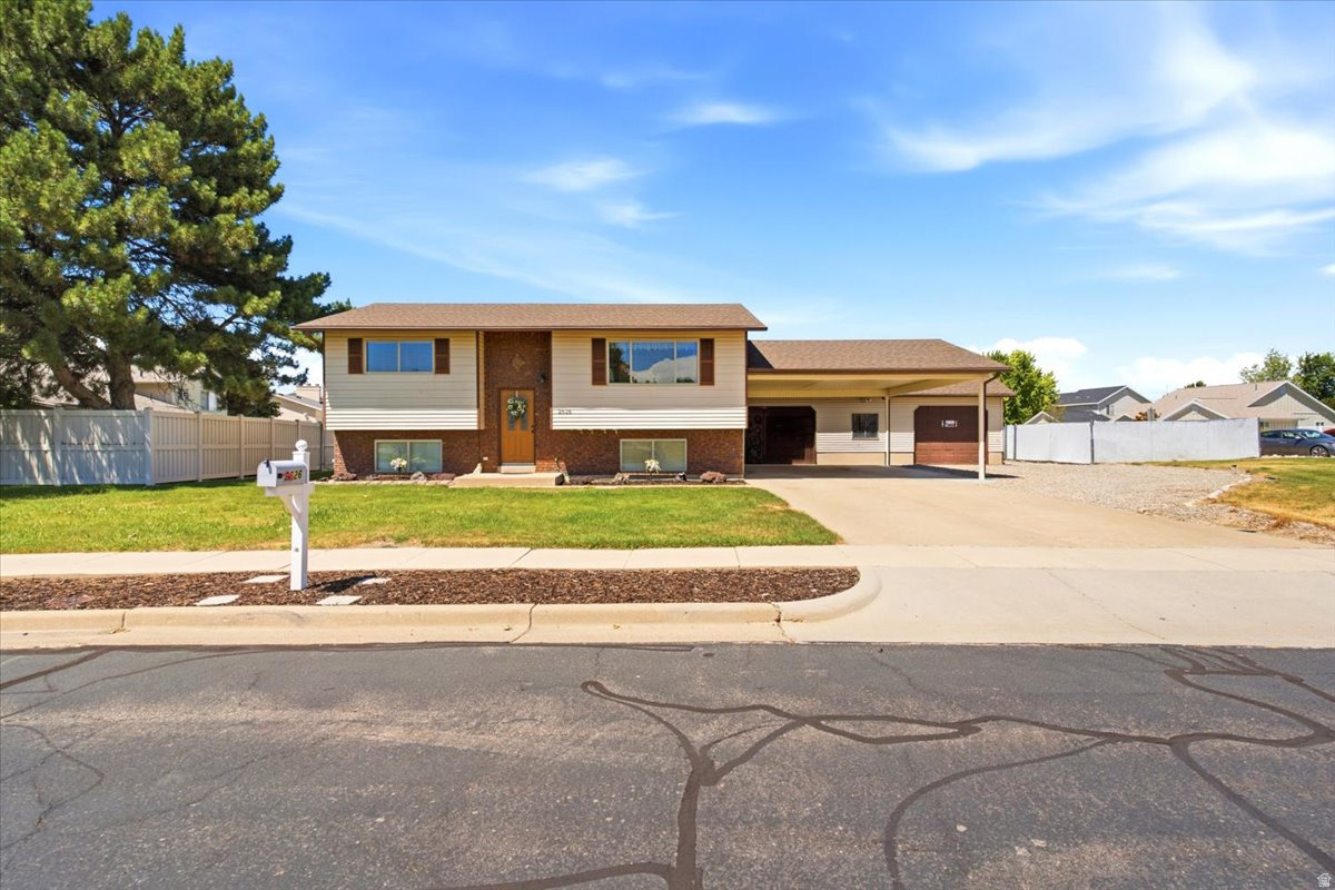 **Move-in ready and impeccably maintained!** This super clean home sits on a spacious **0.40-acre lot** and offers the perfect combination of comfort, storage, and workspace. The dream Garage/Shop **40' x 22' ** provides plenty of room for vehicles, toys, and a workshop, while an additional oversized storage shed 24' x 16'offers even more space for equipment and hobbies. Enjoy the fully fenced backyard featuring a **huge 36' x 28' patio** that's perfect for entertaining, relaxing, or summer BBQs. Major updates include a newer roof, air conditioner, and furnace, giving buyers added peace of mind. If you're looking for a property with room to spread out, abundant storage, and a home that's truly move-in ready, this one is a must-see!
