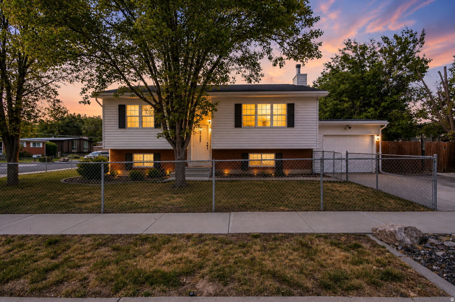 Outstanding split-level home in the heart of South Salt Lake offering exceptional flexibility for owner-occupants, investors, or short-term rental opportunities. Designed for comfortable living, this spacious home features updated kitchens and bathrooms, durable LVP flooring throughout, and an open layout filled with natural light. Each level includes 2 bedrooms, a full kitchen, laundry room, and a large living/family room-ideal for multi-generational living, rental income potential, or maximizing space and privacy. Recent improvements include a new roof installed in 2023 and new window shades throughout the home. Conveniently located near shopping, dining, freeway access, and downtown amenities, this versatile property is a rare opportunity with endless possibilities.
