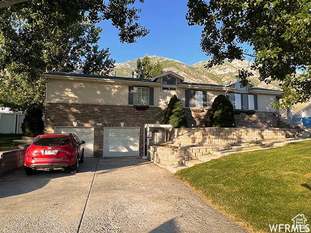 2nd garage/workshop detached and site built with a large cement driveway. This 7 bedroom, 5 Bath home has also had many upgrades. The 2/3rds acre also has an extended 35 ft carport for campers/trailers, a separate utility shed, green house, chicken coop, a large orchard, 2 firepit areas, and a 14 ft X 31 ft covered deck. This 4127 sq. ft. home has been well maintained over the years and has many special features not found in standard homes. This includes: Completely finished basement with high ceilings and its own covered entrance from the front at ground level. A 2 story addition on the back side of the house which also has an entrance from the outside, Between the basement and the main floor, there are 2 large master suites each with walk-in closets and master bathrooms. Main floor master bath is over 120 sq. ft. with an updated Jacuzzi tub. Handicap accessibility: An efficient, secure chain-drive elevator (up to 3 adults) from main floor down to car garage (all parts updated in 2019). A 56-ft wrap-around ramp off the back deck. An upgraded kitchen with pull-out shelves in lower cabinets. 3 HVAC heating/cooling systems. 2 Water heaters, 2 laundry rooms, and a water softener Earthquake stability: 9 ft ceilings in the basement. Main floor also constructed with 2" X 6" exterior wall studs. Triple pane e-glass windows with extra insulating, energy efficient Magnetic Window-Panes on entire west side. Blocks 70% more outside noise, Stain-glass Magnetic Pane in skylight window is also removable. All rooms also have TV and internet outlets. 75 Sq. Ft fully reinforced concrete underground cold storage. Generator hook ups for emergencies with transfer switch inside the home. Heavy Duty Steel Security Doors on all 4 outside entrances in the front and back. New steps into the house and 220 added to the shop in the back. New Furnace/AC on Main 9-25 New Water heater in basement and New Roof 11-25