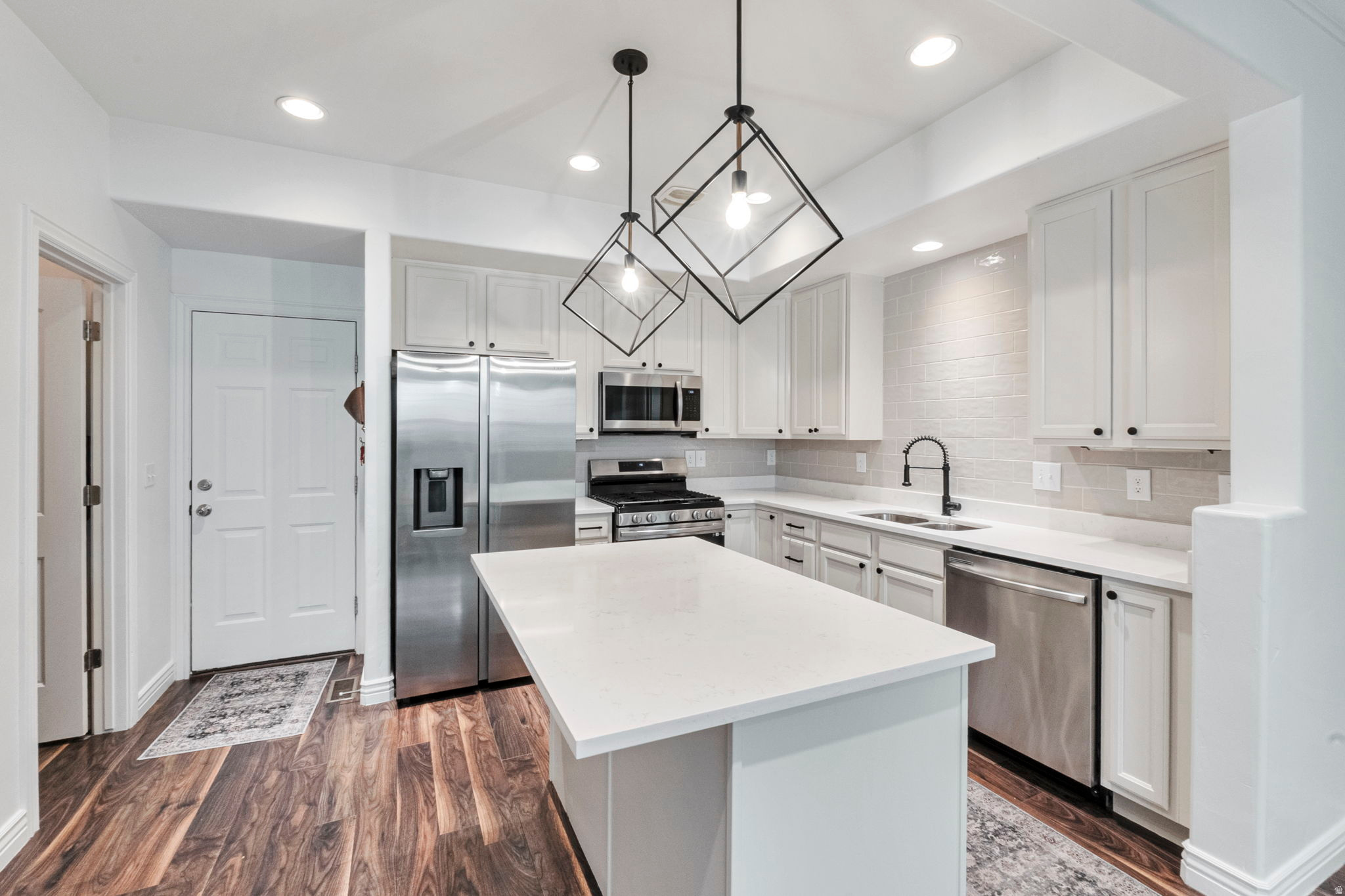 NEW PRICE!! This Eastlake Village beauty is a must-see! This end-row townhome features an excellent open layout flooded with natural light and a modern, updated kitchen complete with a full pantry. Beyond the fresh paint and spacious master suite, you are steps away from the Eastlake pool and the best of the Daybreak lifestyle. Enjoy resident access to Oquirrh Lake for kayaking, miles of trails, fitness centers, and neighborhood food trucks. PRIME UPDATES: New high-efficiency furnace & water heater (Late 2024) with a 10-year transferable warranty! The fully finished basement offers a private guest retreat complete with a soaking tub. BUYER INCENTIVE: The seller wants to make your transition seamless! With an acceptable offer, the seller is willing to negotiate a generous credit to be applied toward closing costs, an interest rate buy-down, or the community's current HOA assessment. We are ready to work with you to keep your monthly payment perfectly comfortable!