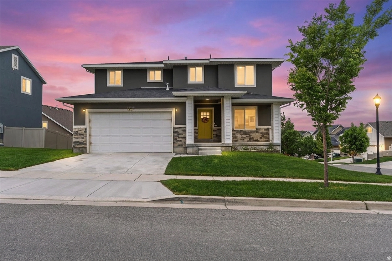 Fresh price improvement on this well-kept modern Bluffdale home with no HOA restrictions. Thoughtfully designed for both comfort and functionality, the home features an open-concept layout with a spacious kitchen complete with stainless steel appliances, modern finishes, and a large island ideal for entertaining and everyday living. The light-filled main living area flows seamlessly into the private backyard, offering space to relax, play, or grow into. Upstairs, the primary suite provides a quiet retreat with a walk-in closet and upgraded en-suite bathroom. A versatile flex space near the entry makes a great home office, sitting area, or reading nook. Conveniently located just minutes from I-15 with quick access to both Salt Lake and Utah County amenities, dining, and shopping. With the new price adjustment, this home presents an exceptional opportunity in one of Bluffdale's fastest-growing areas. Square footage figures are provided as a courtesy estimate only. Buyer and Buyer's agent to verify all. Some listing photos are virtually staged.