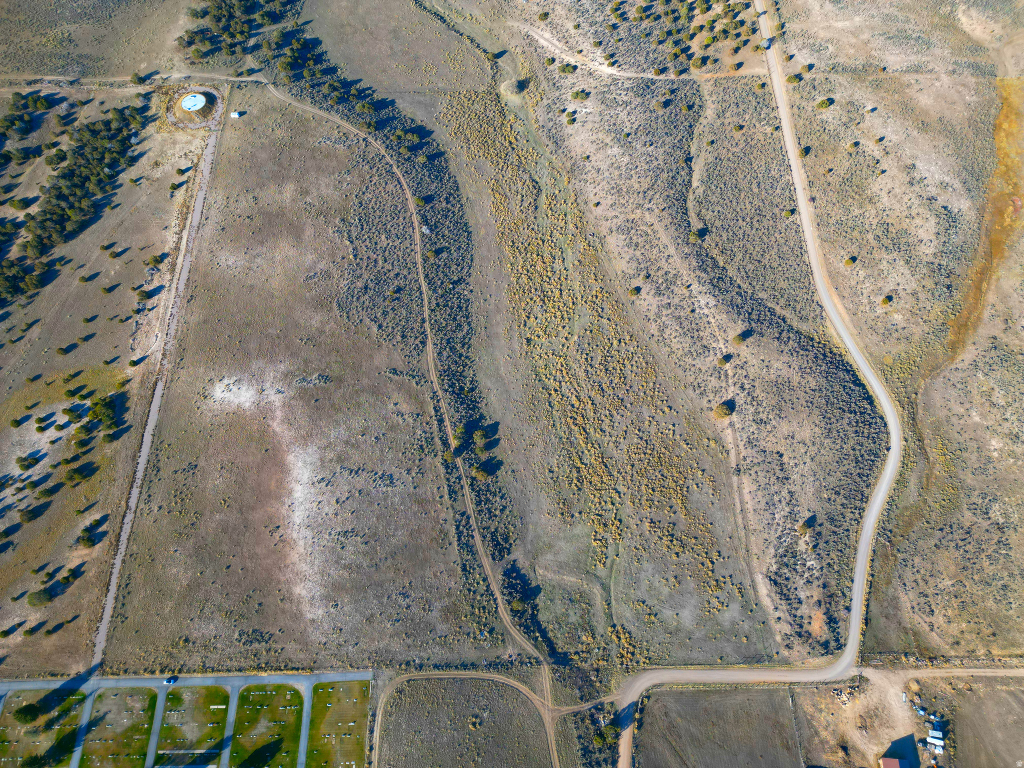 Discover 42.54 acres of peaceful Fairview countryside with endless potential and some of the best views in the valley. Located just 40 minutes from Spanish Fork and tucked directly behind the Fairview Cemetery, this property offers the quietest neighbors you could ask for and a level of serenity that's getting harder to find. Wide-open space, rolling terrain, and unobstructed mountain vistas make this an ideal location for a private homestead, recreational retreat, or future investment opportunity. Included is a valuable water right-equivalent to 2.712 acre-feet, providing options for future use, development, or agricultural needs. And when you're looking for adventure, simply head a short drive-up Fairview Canyon to the Manti-La Sal National Forest, where you'll find endless recreation including hiking, fishing, ATV riding, camping, and world-class snowmobiling. With easy access from town yet complete privacy, this exceptional acreage offers the perfect blend of convenience, recreation, and seclusion. Opportunities like this don't come around often. Come experience the views, the space, and the potential waiting for you on this remarkable Fairview parcel. Boundary lines shown are approximate and based on county plat maps and existing landmarks.  A professional survey is recommended to determine exact property boundaries.  All information within is provided as a courtesy only.  Buyer and Buyer's agent are advised to complete their own due diligence and independent measurements.
