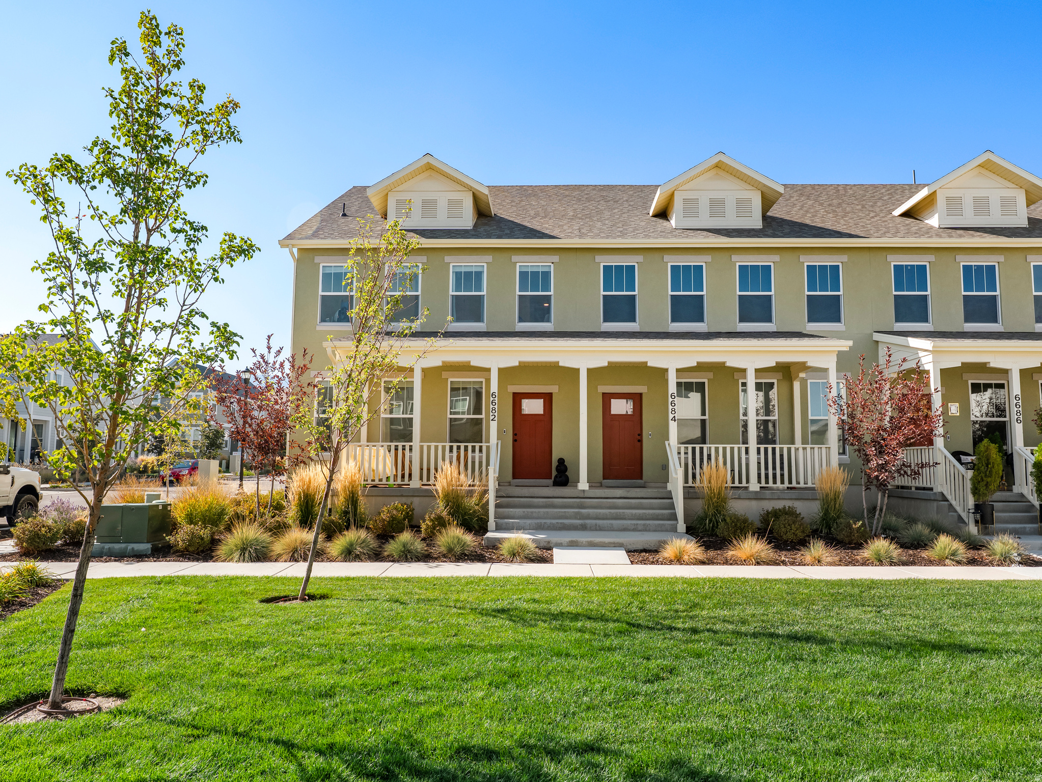Welcome to your light and bright end-unit townhome in the heart of Daybreak's Upper Villages! Built in 2023, this modern 3-bed, 2-bath home offers a sunny, open layout, two-car garage, and a lush community green space just steps from your front porch. What truly sets this home apart is the neighborhood itself-a close-knit community where neighbors look out for one another and friendships come easy. Just a short stroll to The Cove House, Daybreak's newest hangout near the Watercourse-perfect for coffee/soda runs, evening walks, and weekend fun!