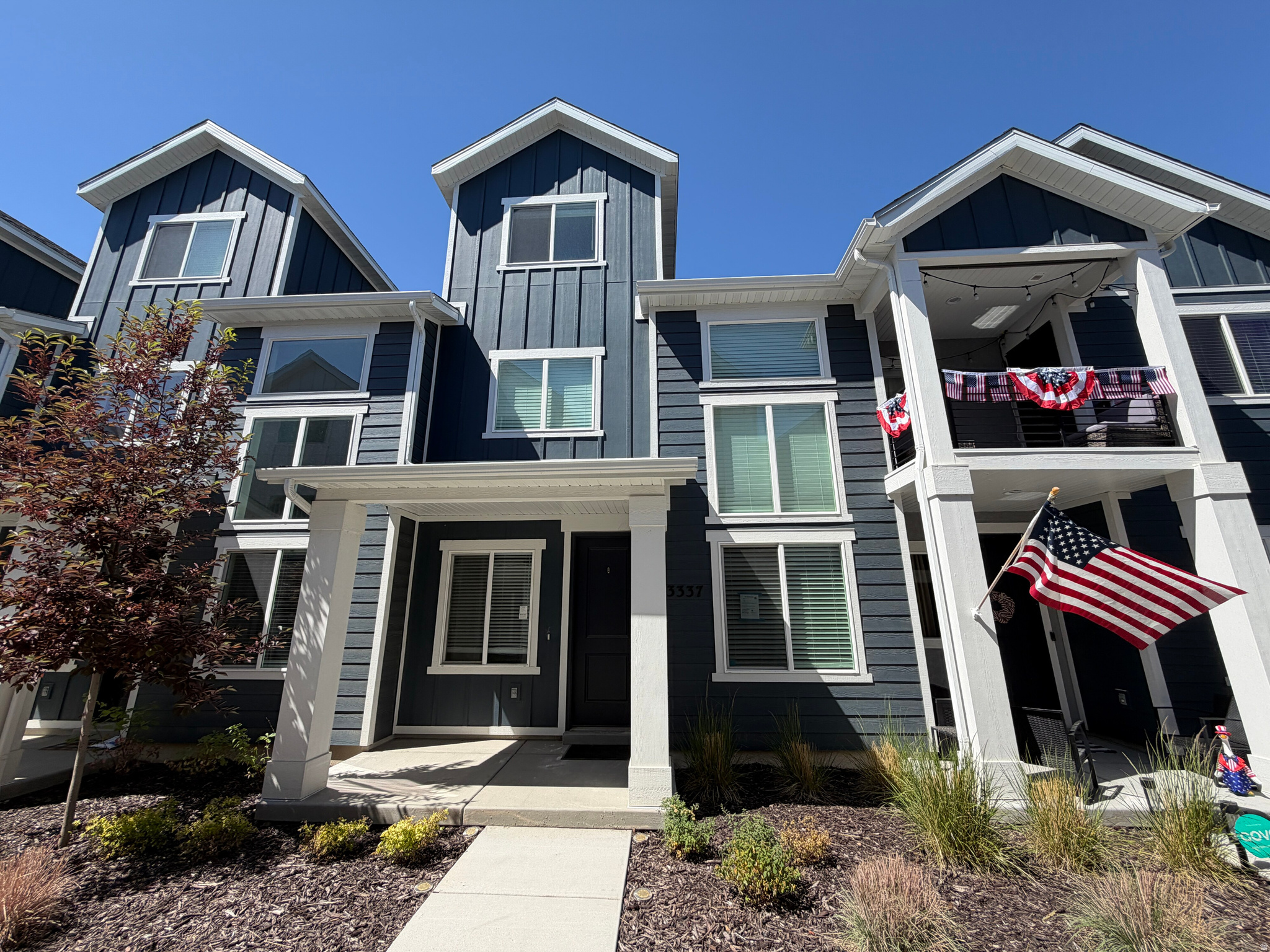 Beautiful standout townhome in the sought-after Legacy at Salt Point community in West Haven. Soaring ceilings in the great room create an immediate sense of openness, drawing in natural light and setting the tone for the thoughtfully designed space throughout. The main floor flows naturally, offering more room than you'd expect and a layout that simply works for everyday living. Tucked away on the second level, the primary suite provides a quiet retreat from the rest of the home, with a loft area that adds flexibility for lounging, reading, or winding down. Head up to the third floor and you'll find three additional bedrooms conveniently grouped with the laundry - keeping the household running without the chaos. Quality upgrades are woven throughout, giving every space a finished, elevated feel that goes well beyond builder-standard. Interior photos shown are of the actual home.