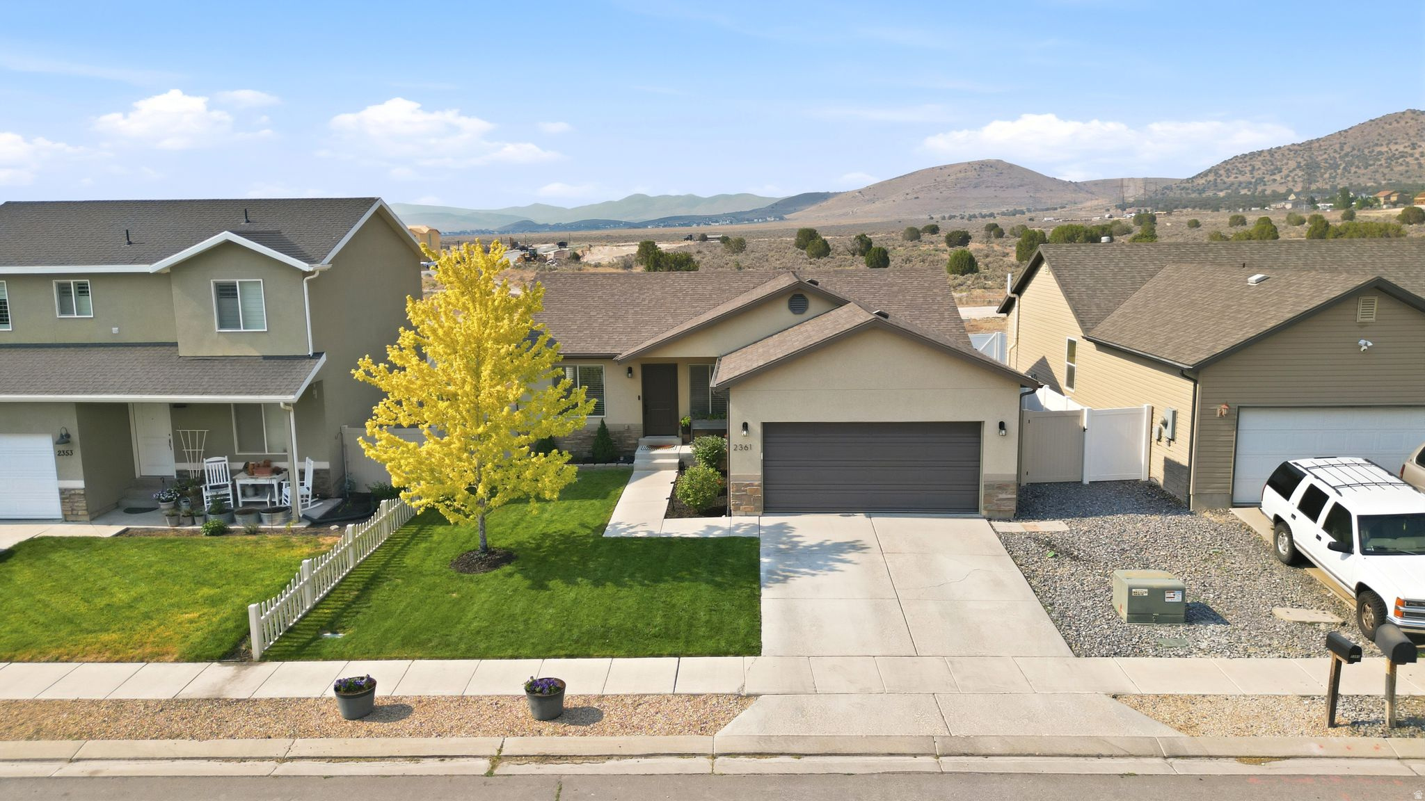 Excellent family home offers 6 bedrooms 3 baths & laundry on the main floor. Granite counters, 18" grout tiles in bathroom. Awesome finished basement with large family room with theater, surround sound high end speakers. Stacked stone gas fireplace, 3 bedrooms and full bathroom, canned lighting. Mountain views. Great family community. Close to several beautiful parks. Trails behind the home.