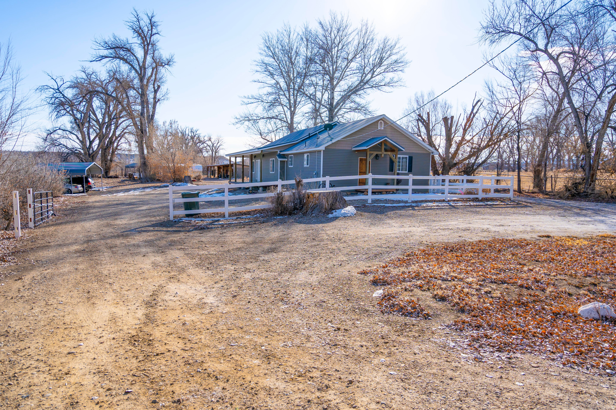 Taking Offers on this Charming Single-Level Home on Spacious Horse Property! Discover the perfect blend of country living and modern peace of mind with this beautiful 3-bedroom, 2-bathroom home. Completely rebuilt in 2011, this residence offers the charm of a rural retreat with all the reliability and conveniences of newer construction, located just minutes from town. Enjoy fresh air, open space, and the serenity of nature right at your doorstep. Property Highlights: Completely Rebuilt in 2011: Enjoy a move-in ready experience with modern comforts and updated peace of mind. Equestrian Ready: Offers ample room for horses and convenient access to nearby secondary water, making it ideal for a rural lifestyle. Historic Landscape: Features a magnificent, historic tree-recognized as one of the oldest in the county-adding timeless character and a unique touch to your acreage. Prime Location: A peaceful country setting that is still just minutes away from local town amenities. Whether you're looking for a peaceful retreat or a place to put down roots, this beautifully updated home is a rare find. Schedule your showing today and experience the beauty of this property for yourself! Square footage figures are provided as a courtesy estimate only and were obtained from county records. Offers are welcome. Buyer is advised to obtain an independent measurement.
