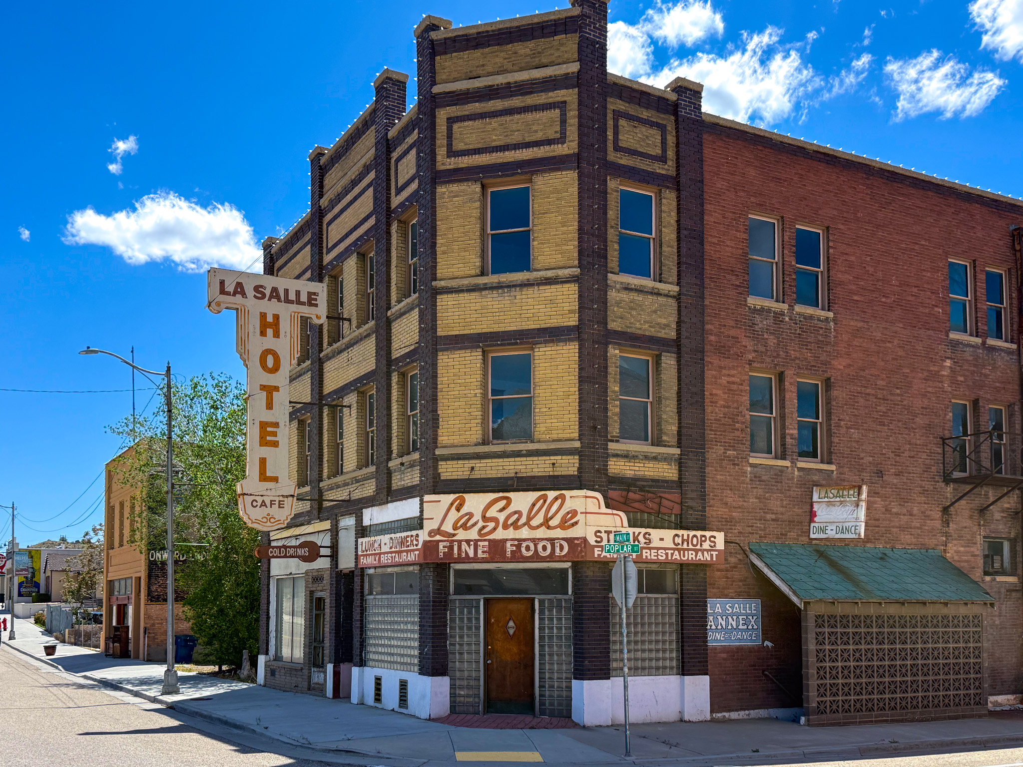 Calling all dreamers, renovators, and lovers of historic charm! The iconic La Salle building on Historic Main Street in Helper is ready for its comeback story. The upper floors were previously used as a hotel, offering exciting restoration potential. The main floor was once a bar and is perfectly positioned for retail, dining, entertainment, or whatever big idea you've been waiting to bring to life. Downstairs, the basement restaurant space is just begging for a revival, while the adjoining salon building adds even more flexibility and opportunity. If you've been searching for a one-of-a-kind project with character, charm, and serious "before-and-after" potential, this could be your masterpiece. Bring your imagination and help write the next chapter of this property! Parcel 1A-0131-0000 is also included. Give us a call and come see it! Square footage figures are provided as a courtesy estimate only.  Buyer is advised to obtain an independent measurement.