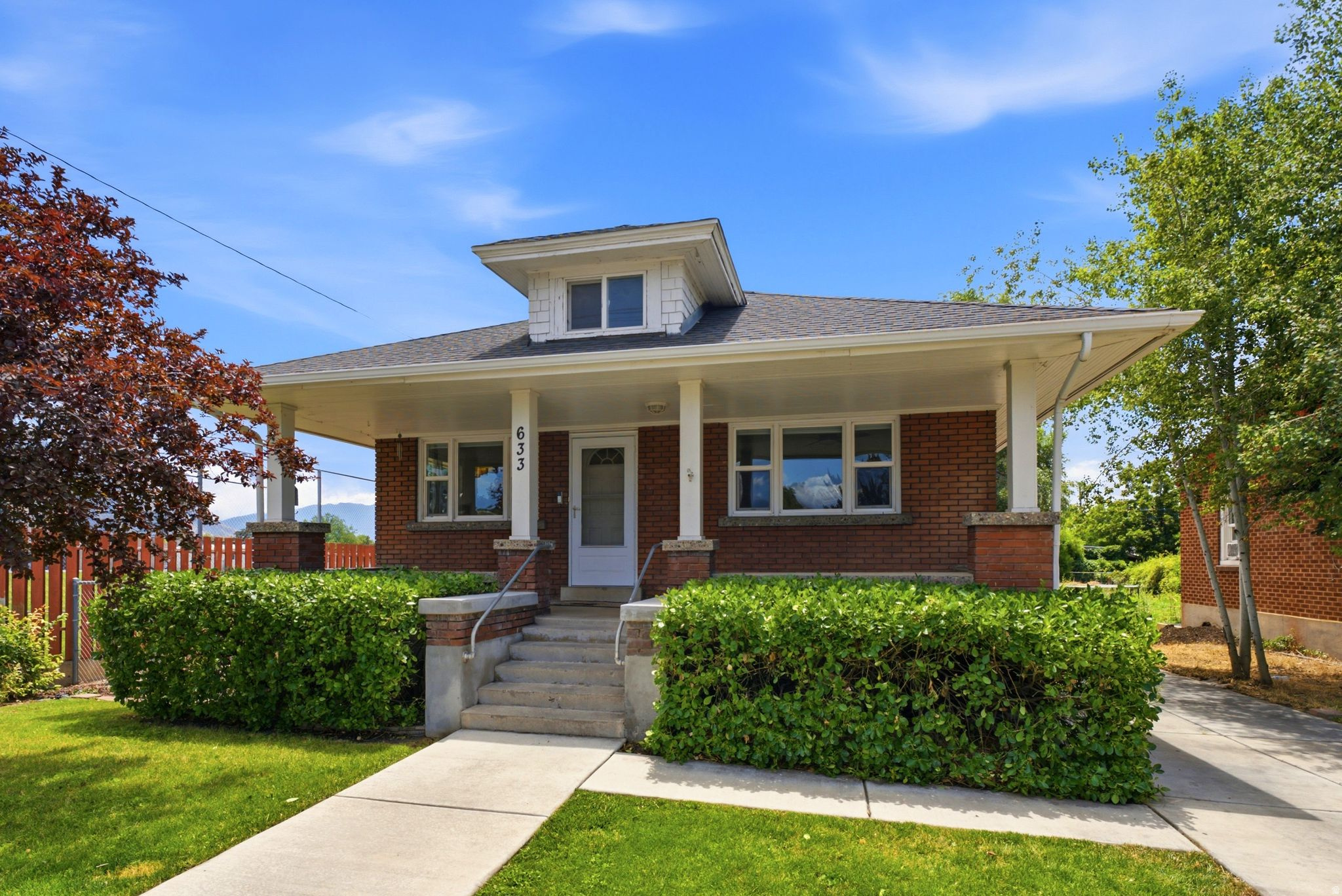 Minutes from BYU's campus, trailheads, and I-15, this beautifully updated historic bungalow sits on an expansive .27-acre lot--leaving just as much to enjoy outside as there is inside. The 5 bedrooms and 3 bathrooms are spread across two functional levels. The upstairs lives as a bright 2-bed, 1-bath main floor with tasteful hardwood floors, while the fully finished lower level offers 3-beds, 2-baths, and generous sized laundry and storage rooms. This layout provides a flexible setup for those looking to create a separated basement apartment, a private space for guests, or multigenerational living. The landscaped .27-acre lot is a genuine retreat: mature shade trees, a large fire-pit area for evenings outdoors, irrigated raised garden beds, and a detached studio (roughly 19' x 13') with its own mini-split-offering an ideal home office, wellness room, or hobby space. The lot is within Provo's Accessory Dwelling Unit overlay and exceeds minimum size requirements, leaving room to expand. This home's character comes without the compromise as the major systems have been updated in recent years, providing a classic Provo bungalow with modern peace of mind. It is move-in ready, thoughtfully improved, and remarkably versatile. Schedule your private showing today! Information deemed reliable but is not guaranteed. Buyer to verify all.