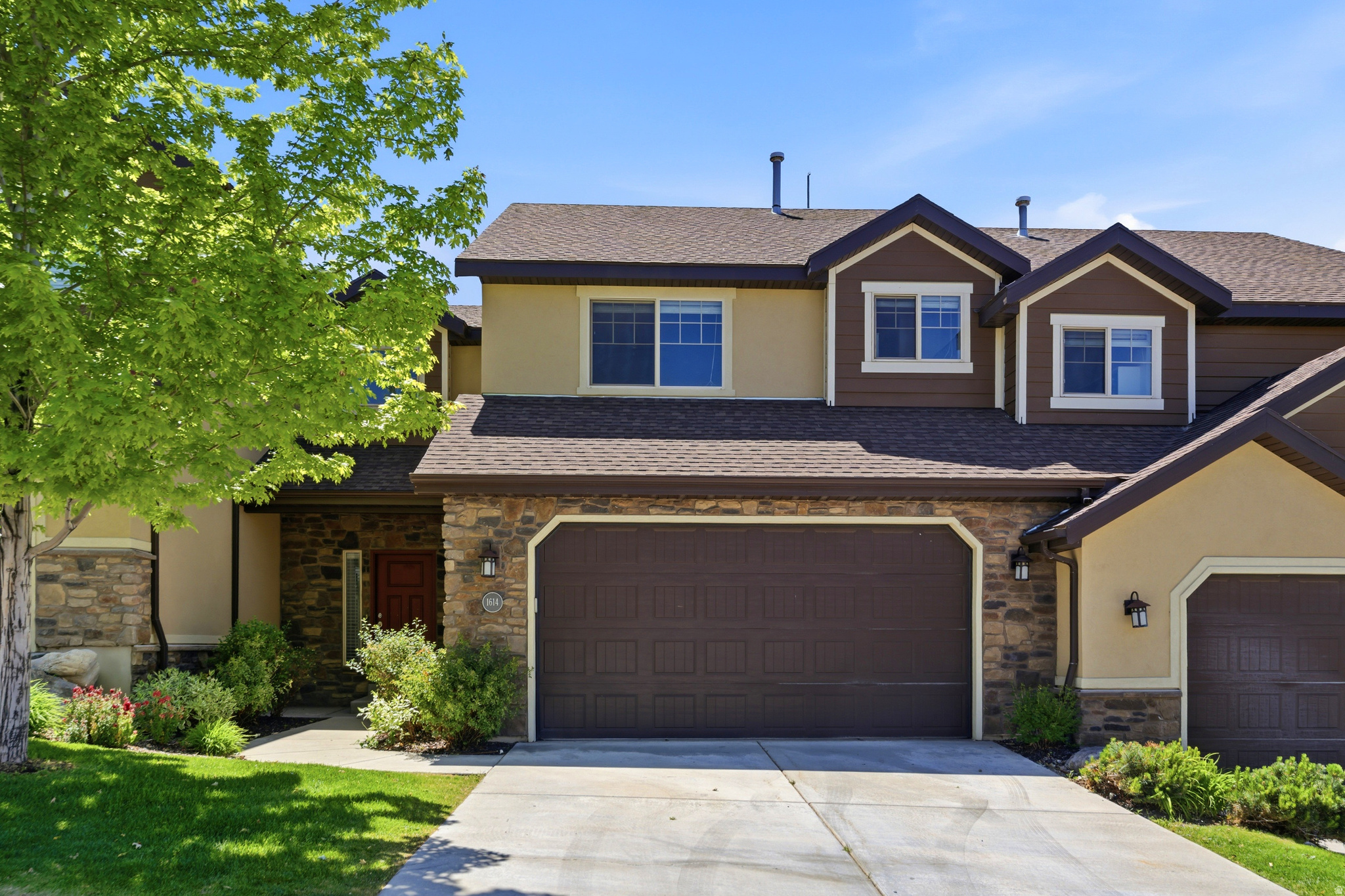 Tucked inside the highly sought-after Aspen Summit community, this beautifully maintained townhome offers the perfect mix of style, comfort, and convenience. Step inside to a bright, open-concept main level featuring an inviting living space, a modern kitchen, a spacious dining area, and a convenient half bath. You'll also enjoy the gorgeous views from your covered balcony, which includes a gas hookup for your BBQ.  Upstairs, you'll find three comfortable bedrooms and two bathrooms, including a private primary suite with its own  ensuite, plus a full bath for the additional bedrooms. The finished basement adds even more versatility with a fourth bedroom, full bath, and a large family room-ideal for hosting guests, creating a home office, or enjoying movie nights and game days.  The Aspen Summit community is located in the foothills of Provo's South East bench at the base of Slate Canyon and includes a community pool for your enjoyment. This unique location offers quick walking access to the Bonneville Shoreline Trail and many other mountain activities, while still just minutes away from BYU, UVU, Provo Towne Center, I-15 and many major area employers.