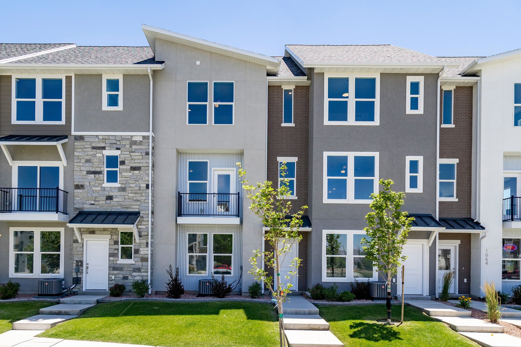 Three-bedroom Soho floor plan at The Ridge at Spanish Fork. This plan features the largest primary suite in the community. The lower level includes a family room and a deep two-car garage. The second level offers an open layout with kitchen, dining, family room, half bath, large laundry, and a versatile bedroom/office. The top floor has the oversized primary suite, plus another bedroom and full bath. The Ridge is located on the east side of Spanish Fork with sweeping mountain and valley views. Community amenities include a clubhouse, fitness center, indoor/outdoor pool, new pickleball courts, and a dog park. Convenient location near shopping, dining, schools, I-15, and Spanish Fork Canyon. Two, three, and four-bedroom floor plans are available with new inventory ready now. We also work with investors. Tour the model home today. Use our preferred lender and receive a $10,000 credit toward a rate buydown or closing costs.