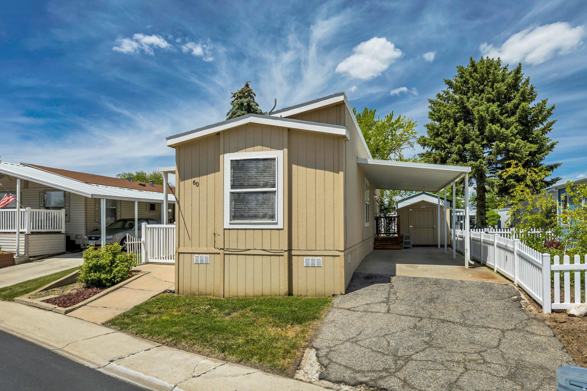 Charming and well-maintained 2-bedroom, 2-bath mobile home located in the desirable Westwood Village community in Farr West. Built in 2012, this 784 sq. ft. home offers a functional open layout with clean, neutral finishes and comfortable living spaces throughout. Has a nice Tuff Shed for extra storage. The home has been well cared for and is move-in ready, making it a great option for affordable living or an investment opportunity. Conveniently located with easy access to shopping, dining, and commuter routes.