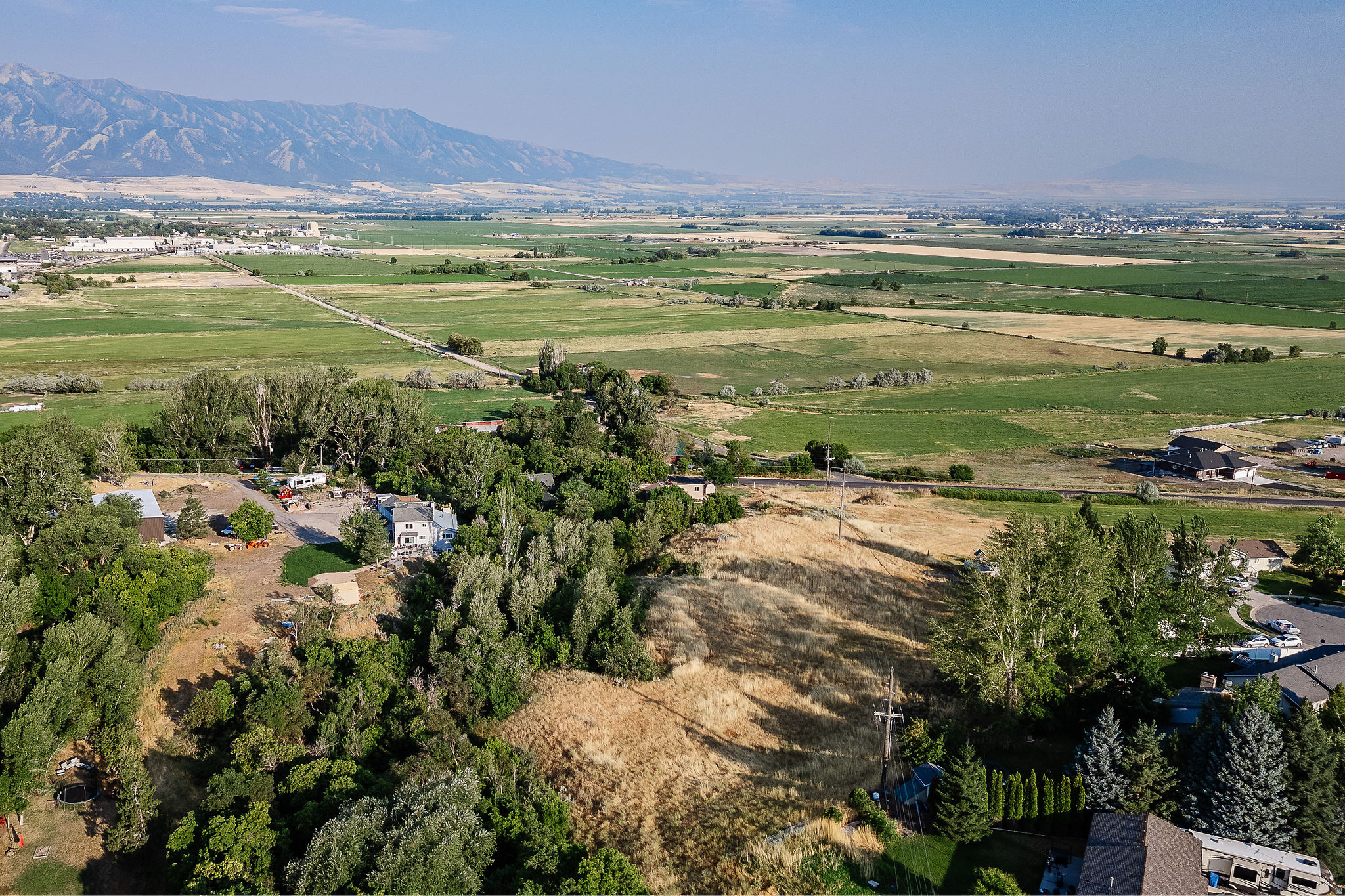 Looking for that a place to build your dream home.  This is it with beautiful views of the Wellsville mountains in all seasons. Room for sheds and animals and much more.  Call for more details.