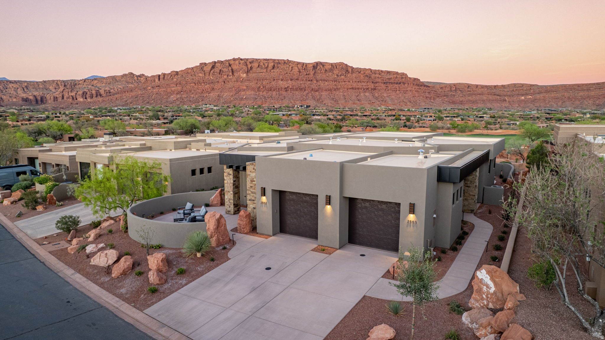 EQUITY GOLF MEMBERSHIP INCLUDED. Beautiful brand-new home located in the Shinava Ridge section of Inn at Entrada, this thoughtfully designed lock off duplex offers 2,660 sq ft of flexible living space, built in 2026 and perfectly suited for nightly rentals, second home use, or multi-generational living. The property is configured as two separate living spaces: a 2 bedroom, 2.5 bath unit with full kitchen, open living area, and private patio, plus a 1 bedroom, 1.5 bath unit with full kitchen, private entrance, and its own outdoor space. Both sides can be used together or independently. 2 car attached garage with storage. Move-in ready. Conveniently positioned within walking distance to the Entrada clubhouse and amenities. Enclosed front and back patios provide functional outdoor living with built-in BBQ and surrounding red rock and mountain views. Community amenities include golf, fitness center, spa, indoor/outdoor pool, pickleball, tennis, dining, and gated security. Strong rental potential with multiple management options including participation in the Inn at Entrada rental program, third-party management, or self-management.