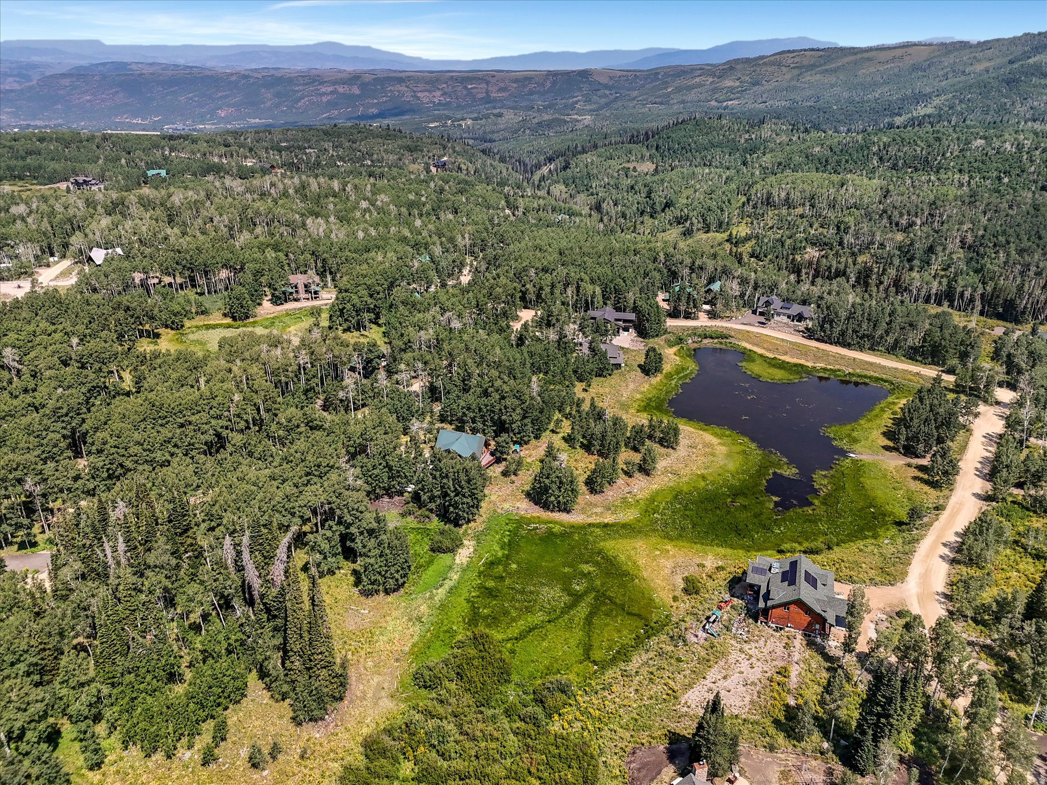 Welcome to 4403 Fawn Way, an exceptional opportunity to own a premier homesite in the highly sought-after upper section of Timber Lakes. This unique property offers unparalleled privacy, bordered on three sides-north (HOA owned), east (common area), and south (HOA owned) ensuring natural separation from neighboring lots and no new development near this property. Enjoy direct access to a scenic meadow and lake just to the east, perfect for hiking, picnicking, and outdoor recreation in the summer. In the winter, this same area transforms into a haven for snowshoeing and snowmobiling. The lot's ideal location ,near the snowmobile gate, also provides quick access to thousands of acres of National Forest land-right from your doorstep. The property features a beautiful mix of mature pine and aspen trees, and is mostly flat with a gentle slope to the south, making it both picturesque and practical for building. Whether you're looking to build your dream mountain retreat or secure a serene getaway spot, this lot offers the perfect balance of privacy, access, and natural beauty. Don't miss this rare opportunity to own one of Timber Lakes' most desirable parcels.