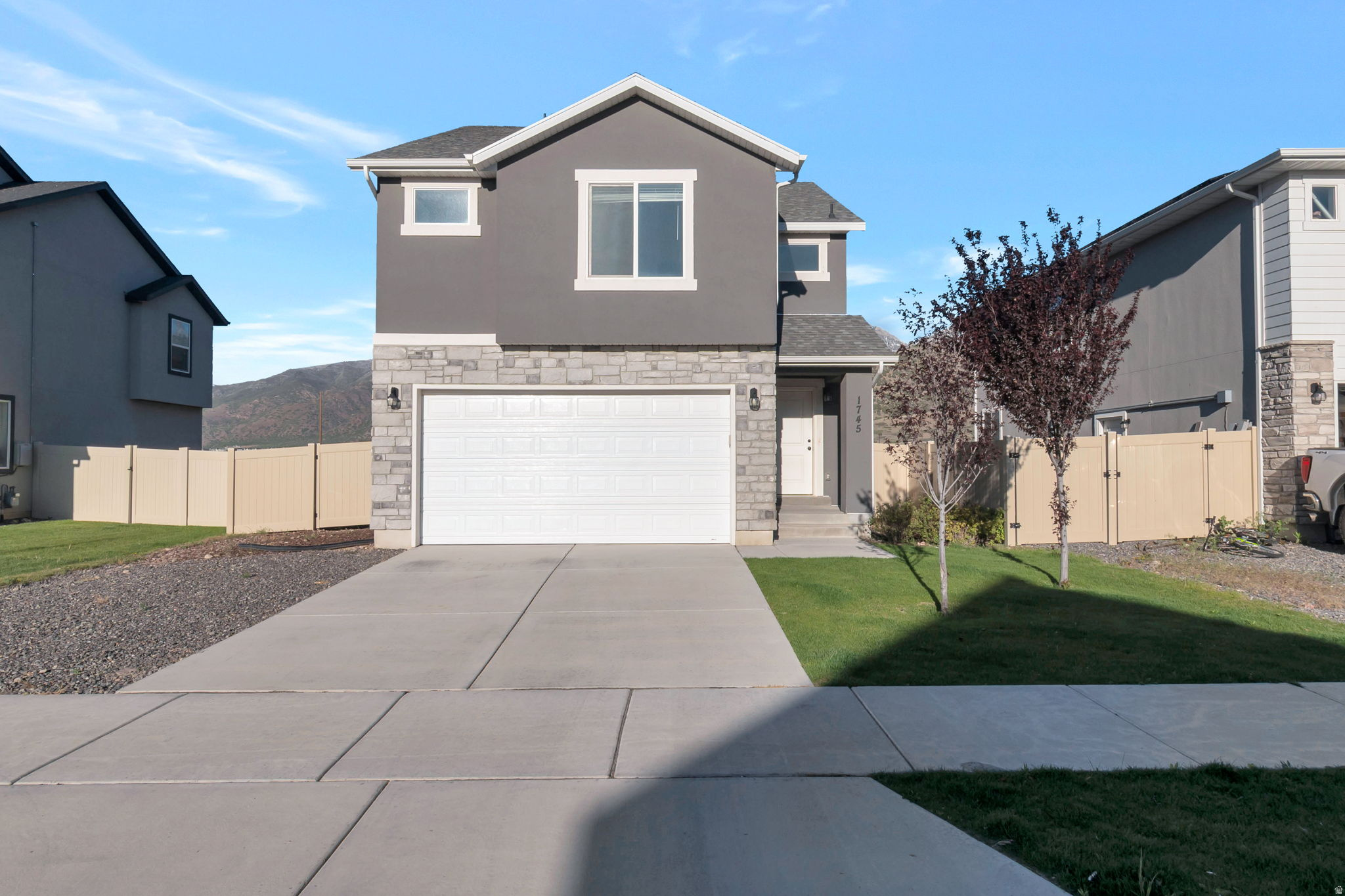 Welcome to this light-filled 2022 home in Santaquin's Summit Ridge community, offering modern comfort, mountain views, and a fully fenced yard with no homes directly behind. The main level features an inviting layout with abundant natural light, a comfortable family room, full kitchen, stainless steel refrigerator included, and convenient access to the backyard. Upstairs you'll find 3 bedrooms, 2.5 bathrooms, a flexible loft space, and an owner's suite with a walk-in closet and private bath. The unfinished basement provides excellent storage today and room to grow in the future, whether for additional living space, a home gym, theater room, or workspace. Enjoy open views toward the Wasatch Mountains, a landscaped and fenced yard, an attached garage, and washer/dryer hookups. Conveniently located just minutes from I-15, less than two miles from Rowley's Red Barn, near neighborhood parks, trails, and outdoor recreation. A great opportunity for a newer single-family home with views, privacy, and future potential.