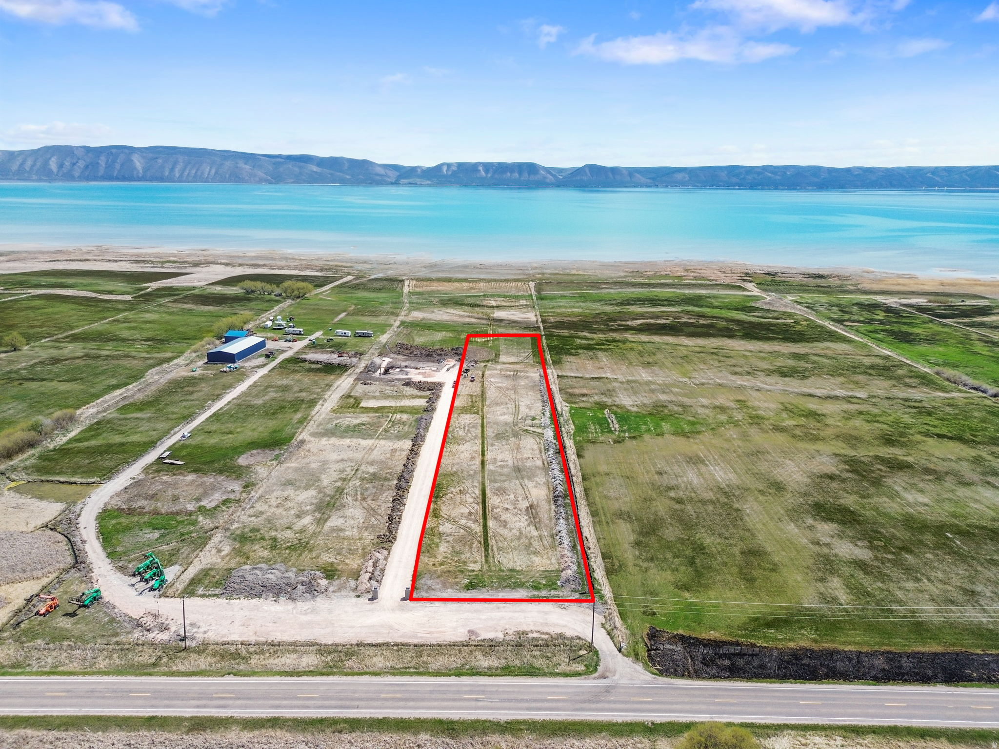 Rare opportunity to own 3.92 acres of prime lakefront property on the breathtaking shores of Bear Lake. This exceptional homesite offers panoramic water views, direct lake access, and the perfect setting to build your dream home, luxury retreat, or legacy property.  Surrounded by the natural beauty of Bear Lake's famous turquoise-blue waters, this spacious parcel provides privacy, open space, and endless recreational opportunities year-round. Enjoy boating, fishing, paddle boarding, swimming, snowmobiling, and more - all right outside your door.
