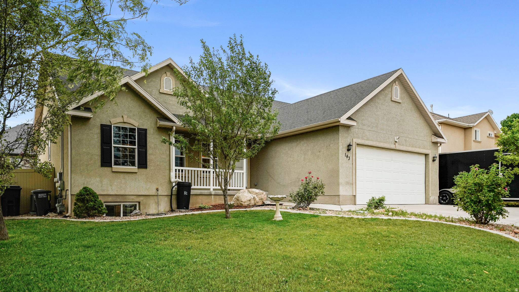 Enjoy the best of Utah County living with this well-maintained home located just minutes from Utah Lake and Talons Cove Golf Club. The fully landscaped and fenced backyard is designed for both relaxation and functionality, featuring an RV pad, mature fruit trees, and large custom concrete garden boxes for year-round gardening. Inside, the spacious basement family room is perfect for movie nights or entertaining, complete with a projector and surround sound system. Washer and dryer hookups on both the main and basement levels provide added convenience, while the basement is already roughed in for a future kitchenette, offering excellent potential for multi-generational living or additional living space. The home also includes fully paid-off solar panels, helping reduce utility costs by approximately $100 per month. With thoughtful upgrades, flexible living space, and a desirable location close to recreation, golf, and outdoor activities, this home is one you won't want to miss.