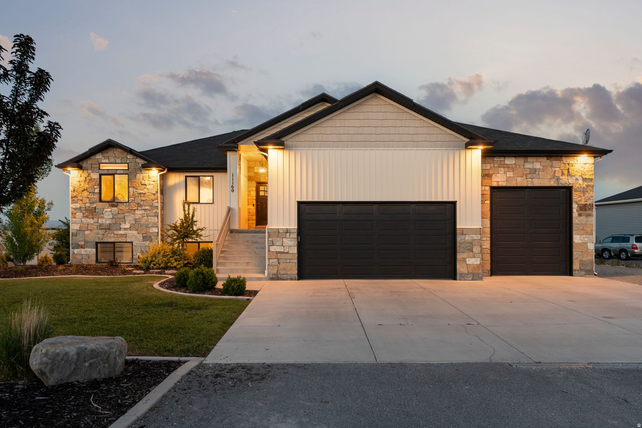 Experience the perfect blend of country living and modern comfort in this beautifully maintained home located in desirable Tremonton. Set on a spacious, fully fenced lot with breathtaking mountain views, this home offers the kind of space, freedom, and versatility that's hard to find. Designed for both everyday living and entertaining, the property features a fully finished walkout basement, expansive outdoor living space that includes a Silo turned into a bar, RV parking, horse property potential, and a massive 3 car garage with room for all the toys. Inside, you'll find an updated kitchen, inviting gathering spaces, and a warm, comfortable atmosphere that instantly feels like home. Whether you're looking for room to grow, space to entertain, or a simple, quieter lifestyle with incredible views and open skies, this property delivers the best of Northern Utah living.