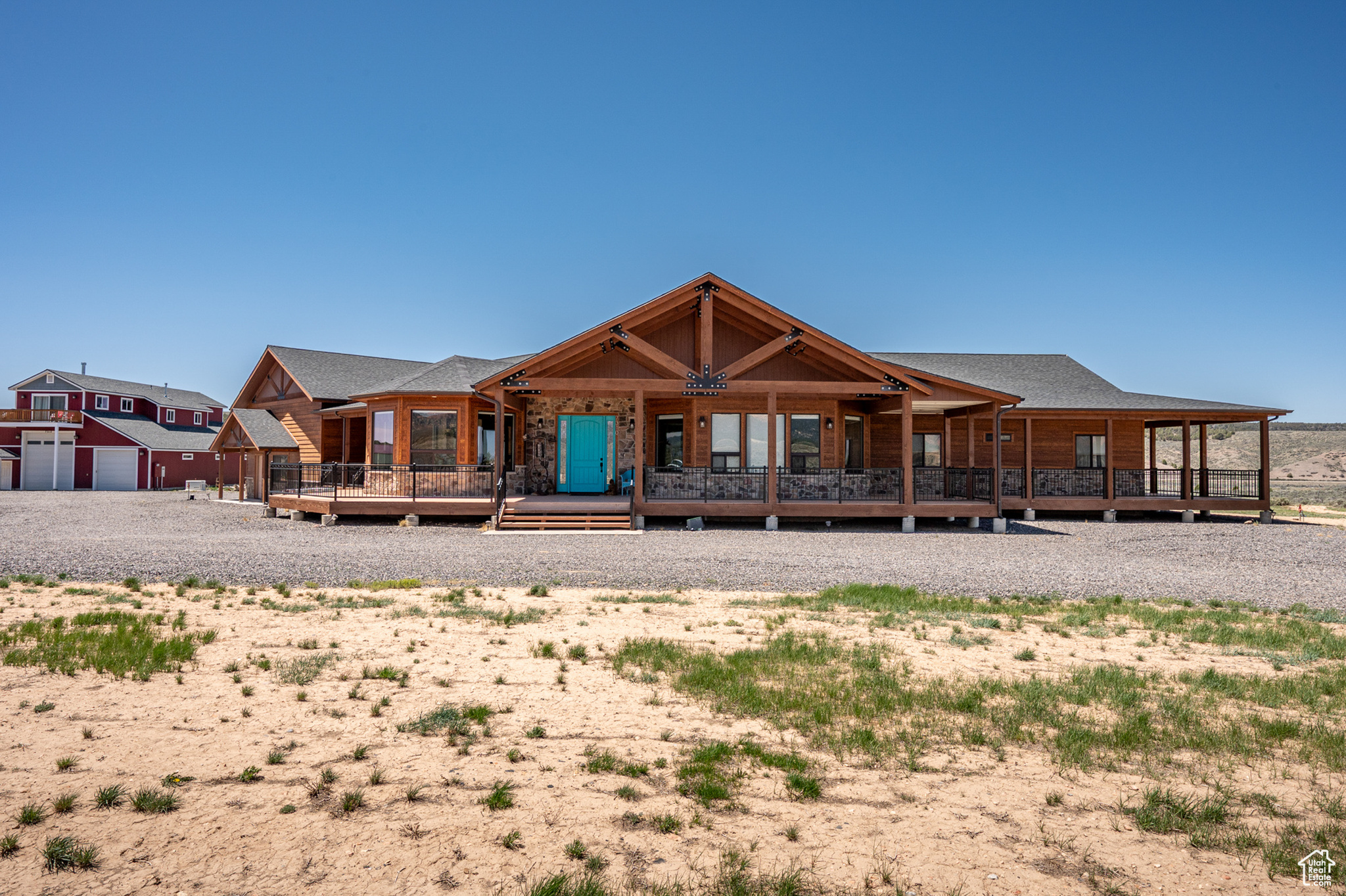 Welcome to Red Cliffs Retreat-where the fishable Sevier River flows just steps from your door and red rock views stretch to the horizon. Set on 24 private acres near Bryce Canyon, this custom 3,360 SF home blends timeless craftsmanship with refined comfort. Enjoy a chef's kitchen, vaulted living spaces, and expansive wraparound decks. A versatile barn with guest quarters, RV hookups, and full workshop supports equestrian or hobby pursuits. Ride out to the trails, cast a line at sunset, and experience the serenity and beauty of Southern Utah at its finest.