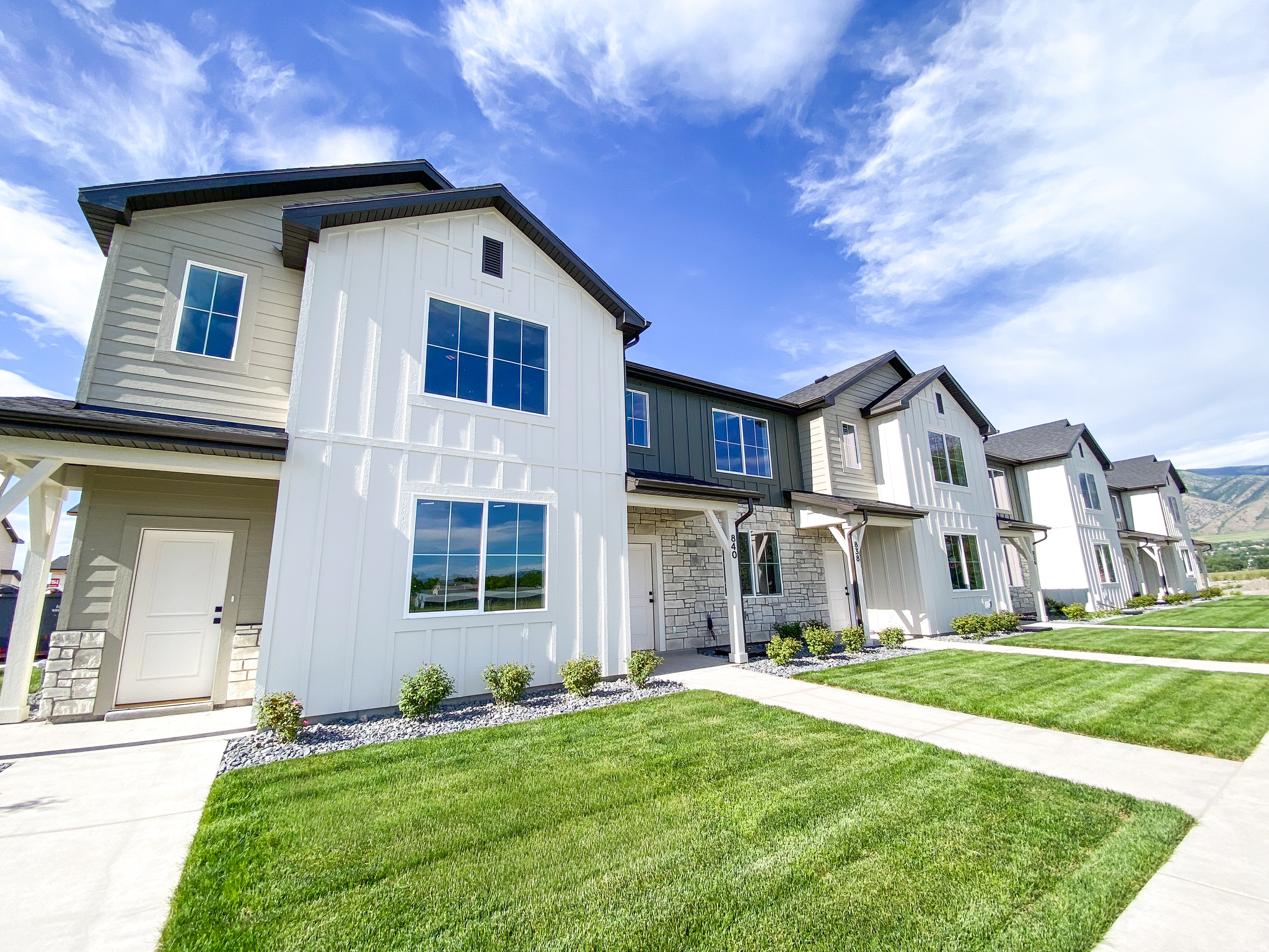 Builder offering $10,000 in concessions plus a washer, dryer, and fridge! Must use builder's trusted lender to receive promotion. Come and out and see them before they are gone. This townhome has a 2 car garage, a large open kitchen and living space with high quality finishes including- quartz countertops, LVP flooring, and stainless steel appliances. Upstairs you'll find 3 bedrooms, including a large master with it's own walk in closet. Enjoy all the amazing future community amenities like the pavilion, pickleball courts, & playground -- all at a great price point. Enjoy beautiful views from this incredible location as well. HOA covers all exterior landscaping maintenance, exterior building maintenance, snow removal on driveways, property & liability insurance coverage, and 1 gig high speed fiber optic internet.
