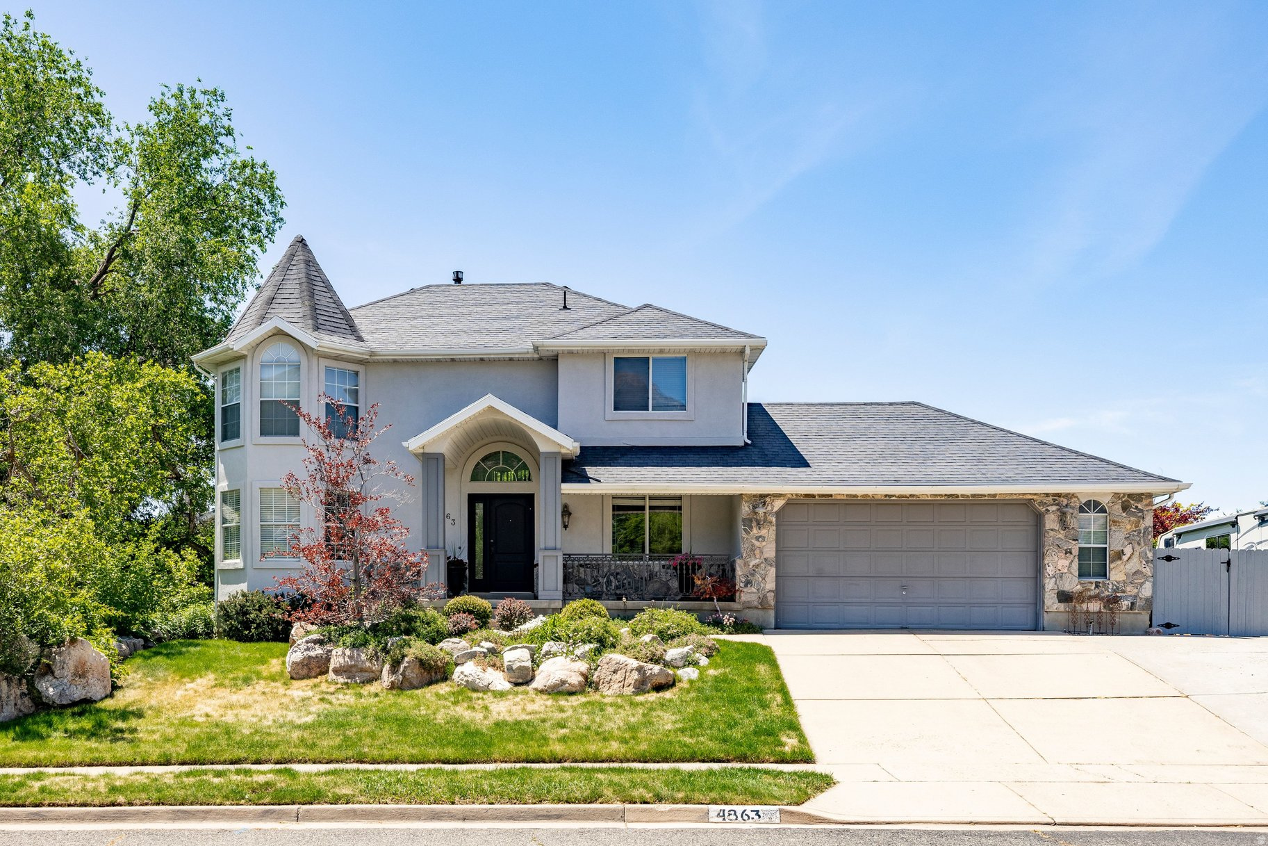Come stake your claim in the highly sought-after Rolling Oaks neighborhood. Designed with both everyday living and entertaining in mind, this home offers generous, functional space for a growing household. Upstairs bedrooms capture beautiful mountain views, while the main living areas overlook a lush, private backyard retreat.  Thoughtful features throughout include a mudroom, oversized laundry room, and a spacious basement complete with abundant storage, a craft room, and a large family room ideal for a theater, game room, or additional gathering space.  Recent upgrades include a new furnace, air duct cleaning, whole-home humidifier, water softener, added parking pad, pedestrian gate, and iodizer system.  Conveniently located just minutes from Harrison Blvd with quick access to I-89 and I-84, this home places you near McKay-Dee Hospital, Weber State University, and Pineview Reservoir. Outdoor recreation is right at your doorstep with Powder Mountain and Snowbasin less than 25 minutes away.