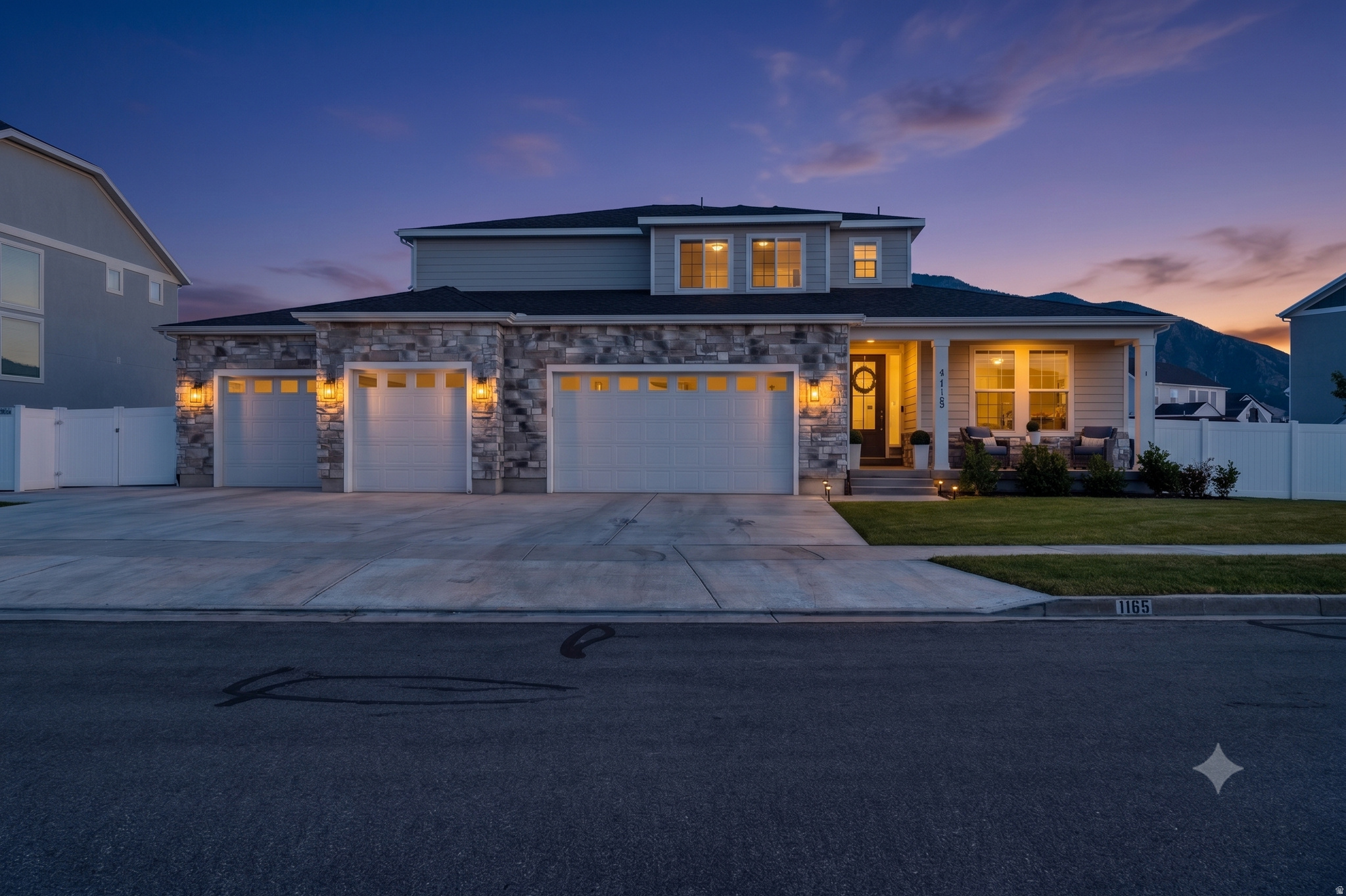 Framed by sweeping mountain vistas in Mapleton Utah and designed for both everyday comfort and grand entertaining, this remarkable residence offers over 5,100 square feet of refined living space on a beautifully situated .33-acre lot. The heart of the home is a stunning gourmet kitchen featuring an expansive gathering bar where family and friends naturally come together. A rare combination of a 4-car garage, dedicated RV parking, and generous living areas provides exceptional convenience without sacrificing elegance. From the breathtaking views to the thoughtfully designed spaces, every detail invites you to live, entertain, and create memories in style. items included are Tankless water heater, water softener, Utility Sink in Garage, Security System, Fiber optic data lines, Double ovens, 9 ft basement ceilings, 2 RV Parking pads